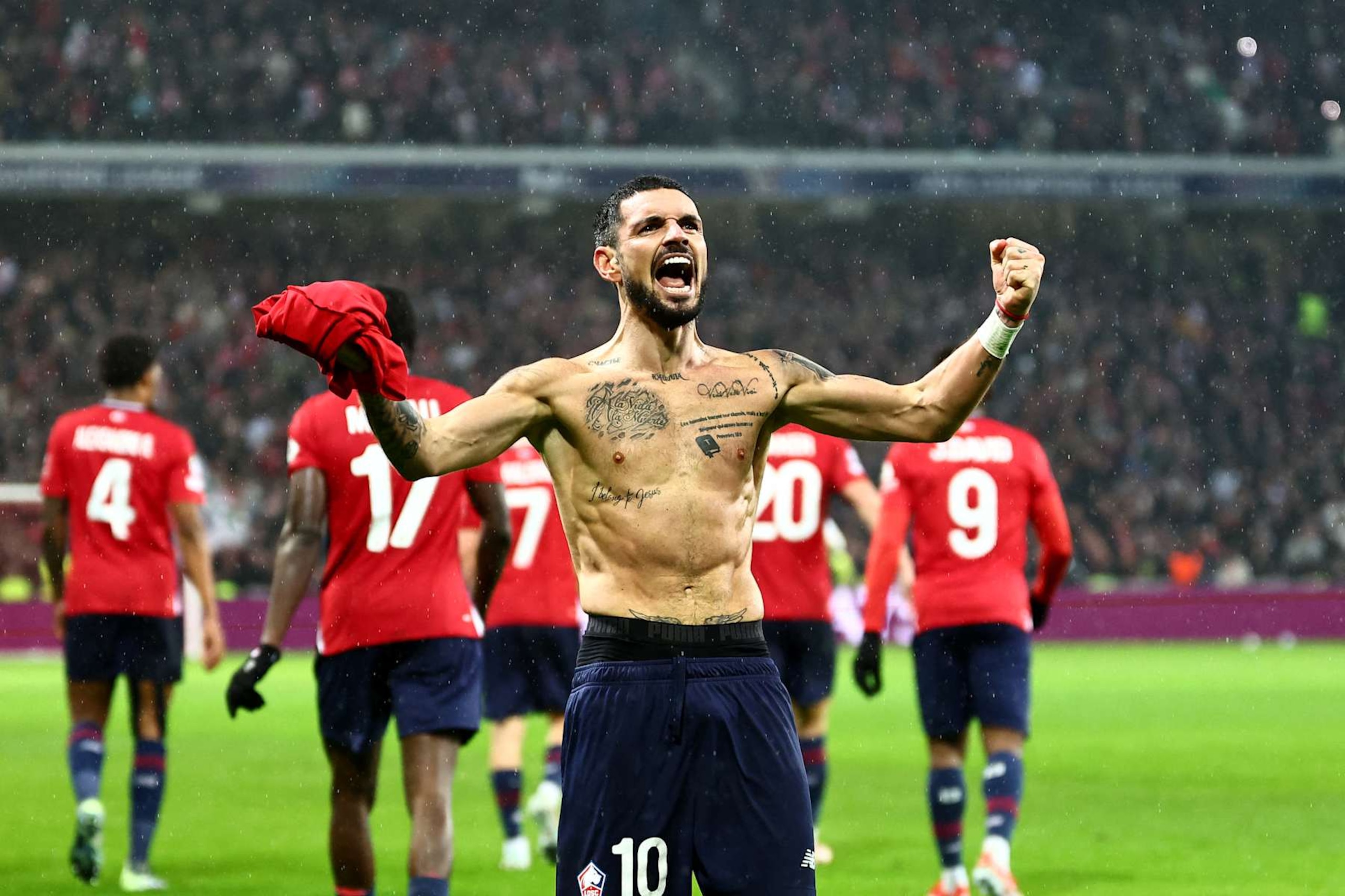 Lille's French midfielder #10 Remy Cabella celebrates scoring his team's sixth goal during the UEFA Champions League, league phase - matchday 8 football match between Lille OSC (LOSC) and Feyenoord Rotterdam at the Stade Pierre-Mauroy in Villeneuve-d'Ascq in Northern France, on January 29, 2025. (Photo by Sameer Al-Doumy / AFP) (Photo by SAMEER AL-DOUMY/AFP via Getty Images)