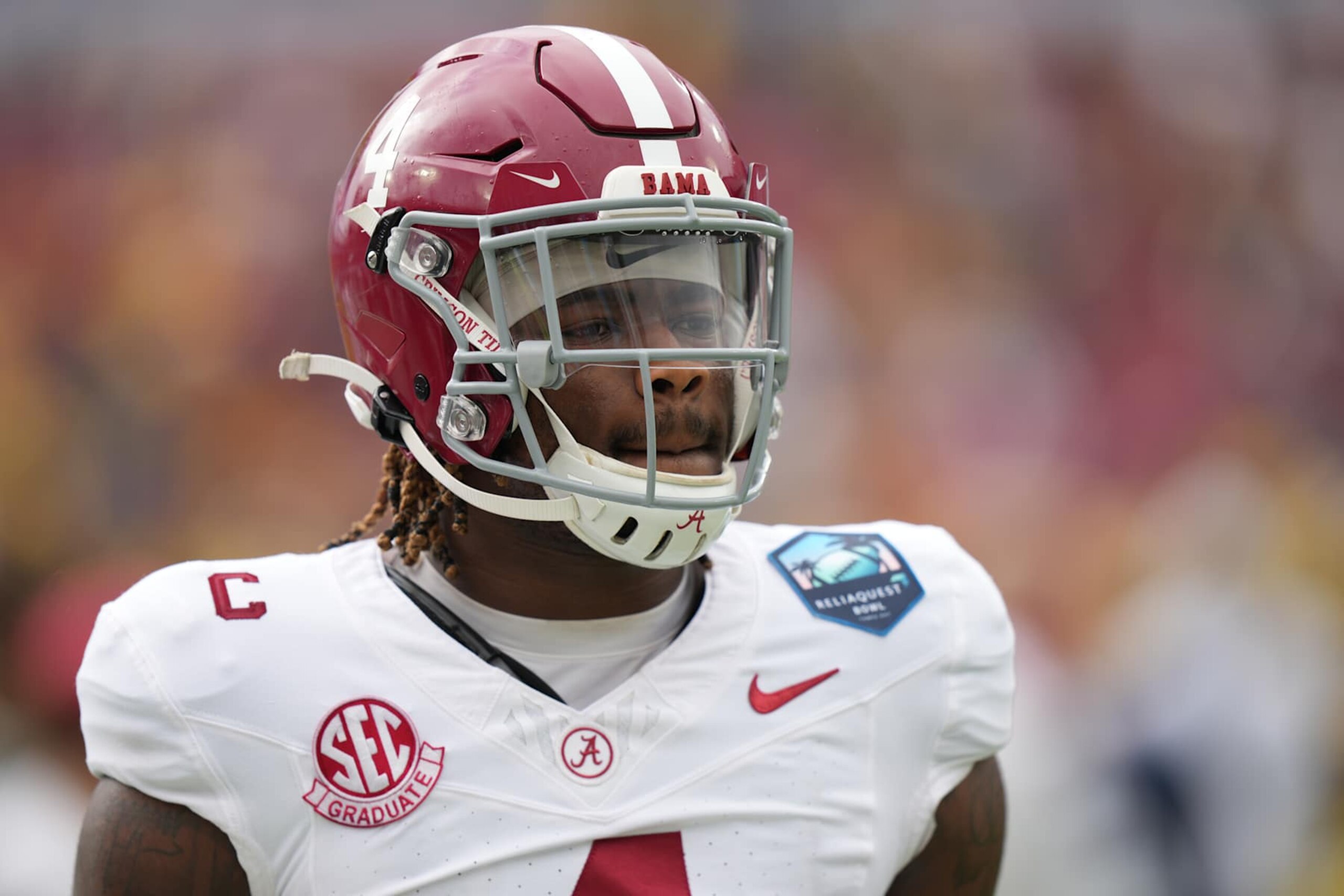 TAMPA, FL - DECEMBER 31: Alabama Crimson Tide quarterback Jalen Milroe (4) warms up before the ReliaQuest Bowl game between the Michigan Wolverines and the Alabama Crimson Tide on Tuesday, December 31, 2024 at Raymond James Stadium in Tampa, Fla. (Photo by Peter Joneleit/Icon Sportswire via Getty Images) TAMPA, FL - DECEMBER 31: Alabama Crimson Tide quarterback Jalen Milroe (4) warms up before the ReliaQuest Bowl game between the Michigan Wolverines and the Alabama Crimson Tide on Tuesday, December 31, 2024 at Raymond James Stadium in Tampa, Fla. (Photo by Peter Joneleit/Icon Sportswire via Getty Images)
