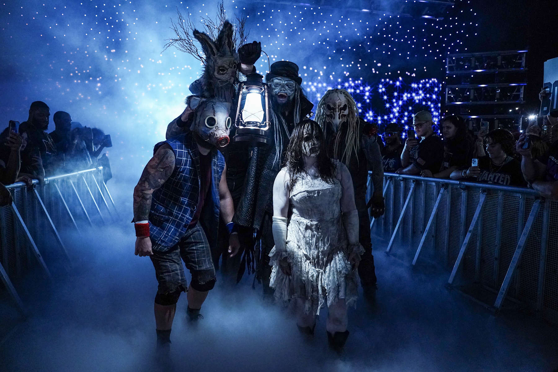 BALTIMORE, MARYLAND - AUGUST 5: Joe Gacy, Erick Rowan, Bo Dallas, Nikki Cross, and Dexter Lumis of the Wyatt Sicks make their way to the ring during Monday Night RAW at CFG Bank Arena on August 5, 2024 in Baltimore, Maryland.  (Photo by WWE/Getty Images)