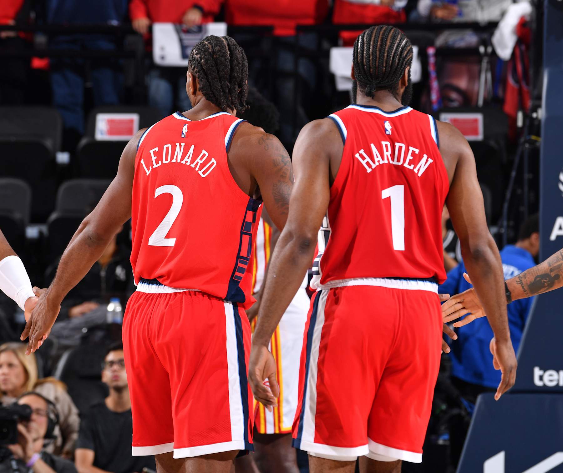 INGLEWOOD, CA - JANUARY 4: Kawhi Leonard #2 and James Harden #1 of the LA Clippers look on during the game against the Atlanta Hawks on January 4, 2025 at Intuit Dome in Los Angeles, California. NOTE TO USER: User expressly acknowledges and agrees that, by downloading and/or using this Photograph, user is consenting to the terms and conditions of the Getty Images License Agreement. Mandatory Copyright Notice: Copyright 2025 NBAE (Photo by Juan Ocampo/NBAE via Getty Images)