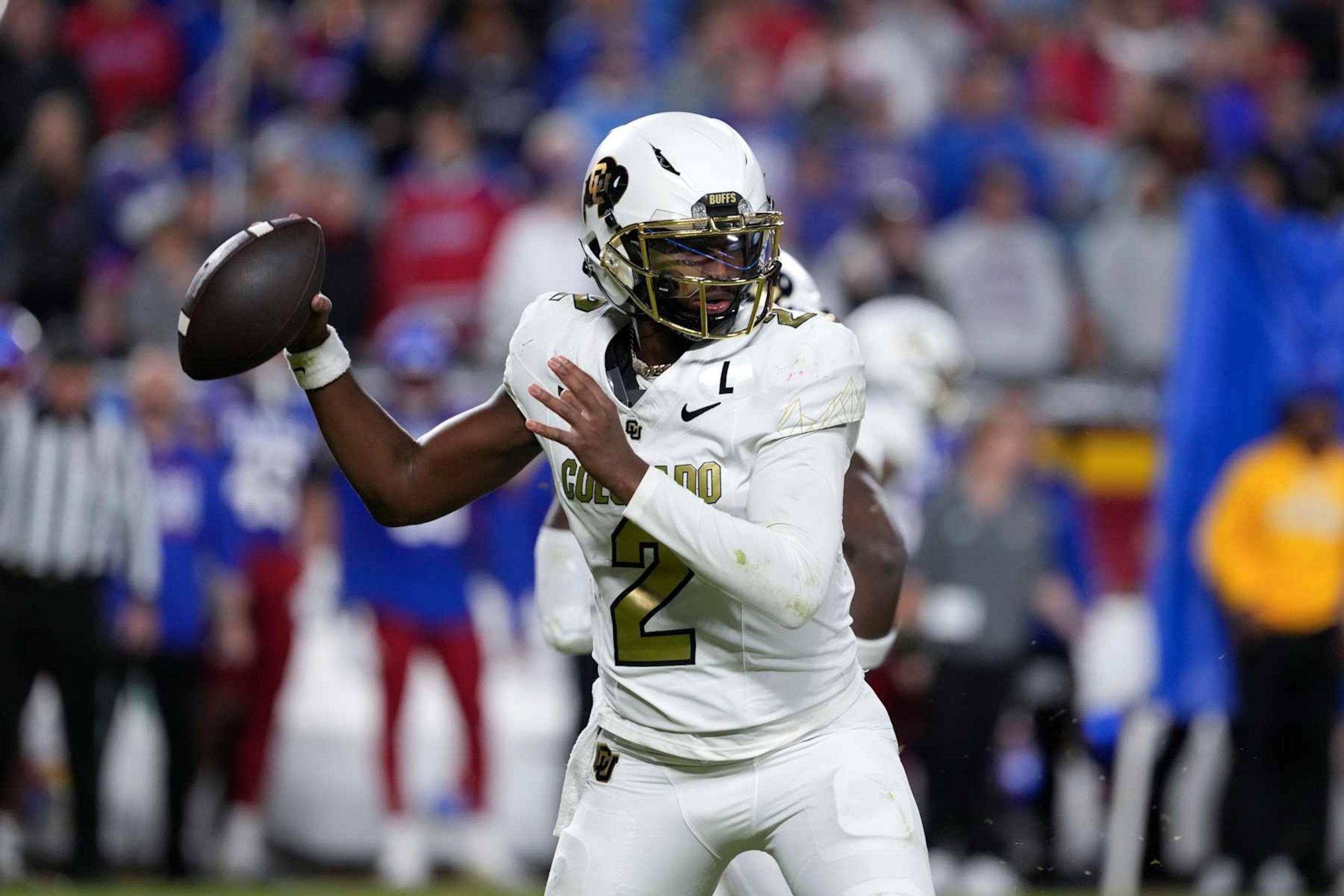 KANSAS CITY, MISSOURI - NOVEMBER 23: Quarterback Shedeur Sanders #2 of the Colorado Buffaloes passes in the second half against the Kansas Jayhawks at Arrowhead Stadium on November 23, 2024 in Kansas City, Missouri.  (Photo by Ed Zurga/Getty Images)