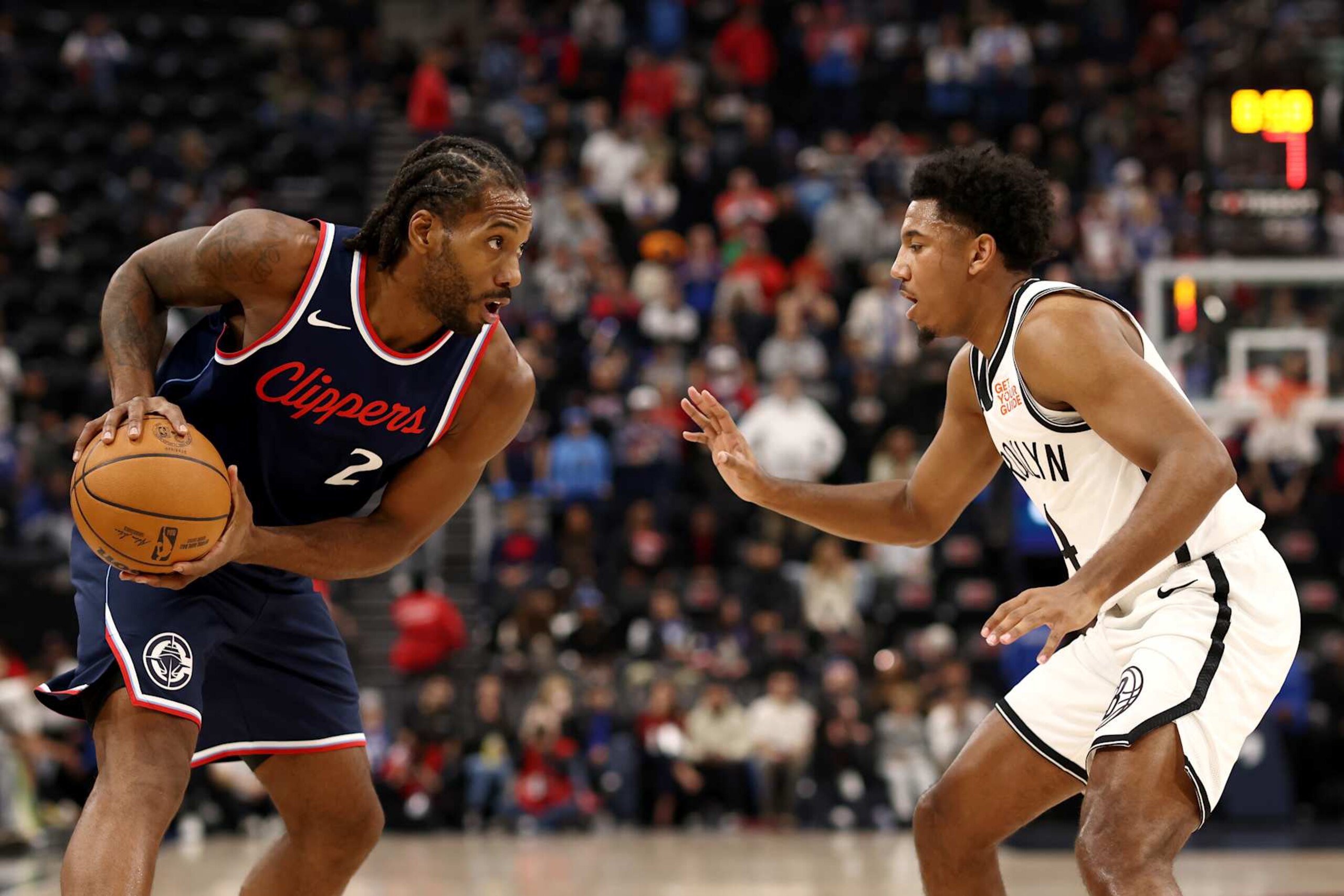 INGLEWOOD, CALIFORNIA - JANUARY 15: Kawhi Leonard #2 of the Los Angeles Clippers looks to pass the ball against Reece Beekman #4 of the Brooklyn Nets during the second quarter at Intuit Dome on January 15, 2025 in Inglewood, California. NOTE TO USER: User expressly acknowledges and agrees that, by downloading and/or using this Photograph, user is consenting to the terms and conditions of the Getty Images License Agreement. (Photo by Katelyn Mulcahy/Getty Images)