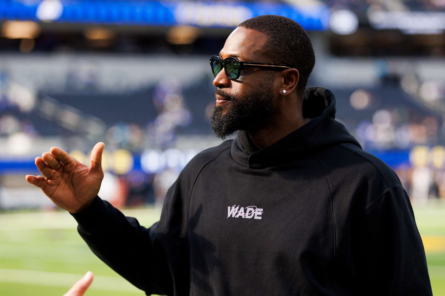 INGLEWOOD, CALIFORNIA - JANUARY 5: Former NBA player Dwyane Wade walks the sideline before the game between the Seattle Seahawks and the Los Angeles Rams at SoFi Stadium on January 5, 2025 in Inglewood, California. (Photo by Ric Tapia/Getty Images)