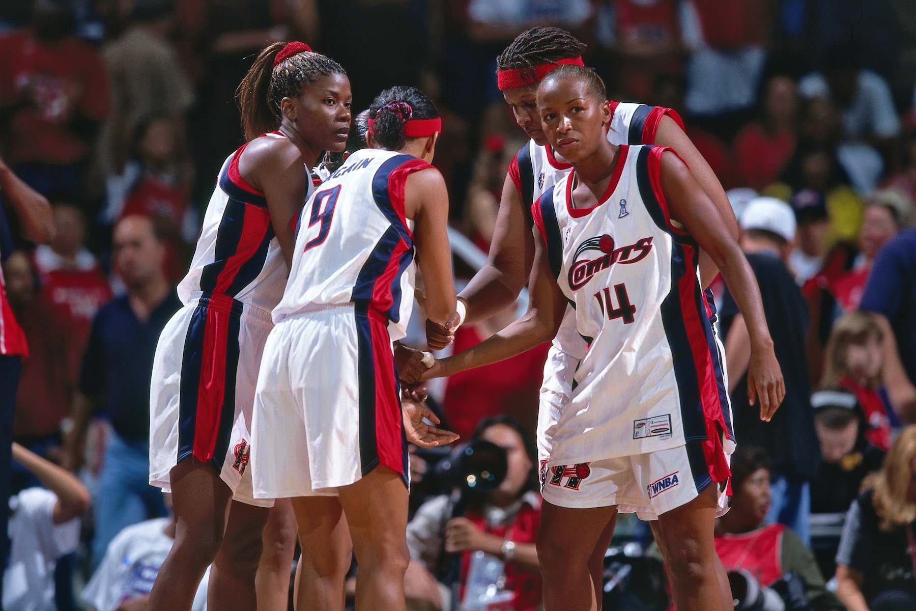 HOUSTON - AUGUST 26: Cynthia Cooper of the Houston Comets huddles the team during Game Two of the 2000 WNBA Finals on August 26, 2000 at the Compaq Center in Houston, Texas.NOTE TO USER: User expressly acknowledges and agrees that, by downloading and or using this photograph, User is consenting to the terms and conditions of the Getty Images License Agreement. Mandatory Copyright Notice: Copyright 2000 NBAE (Photo by Bill Baptist/NBAE via Getty Images)