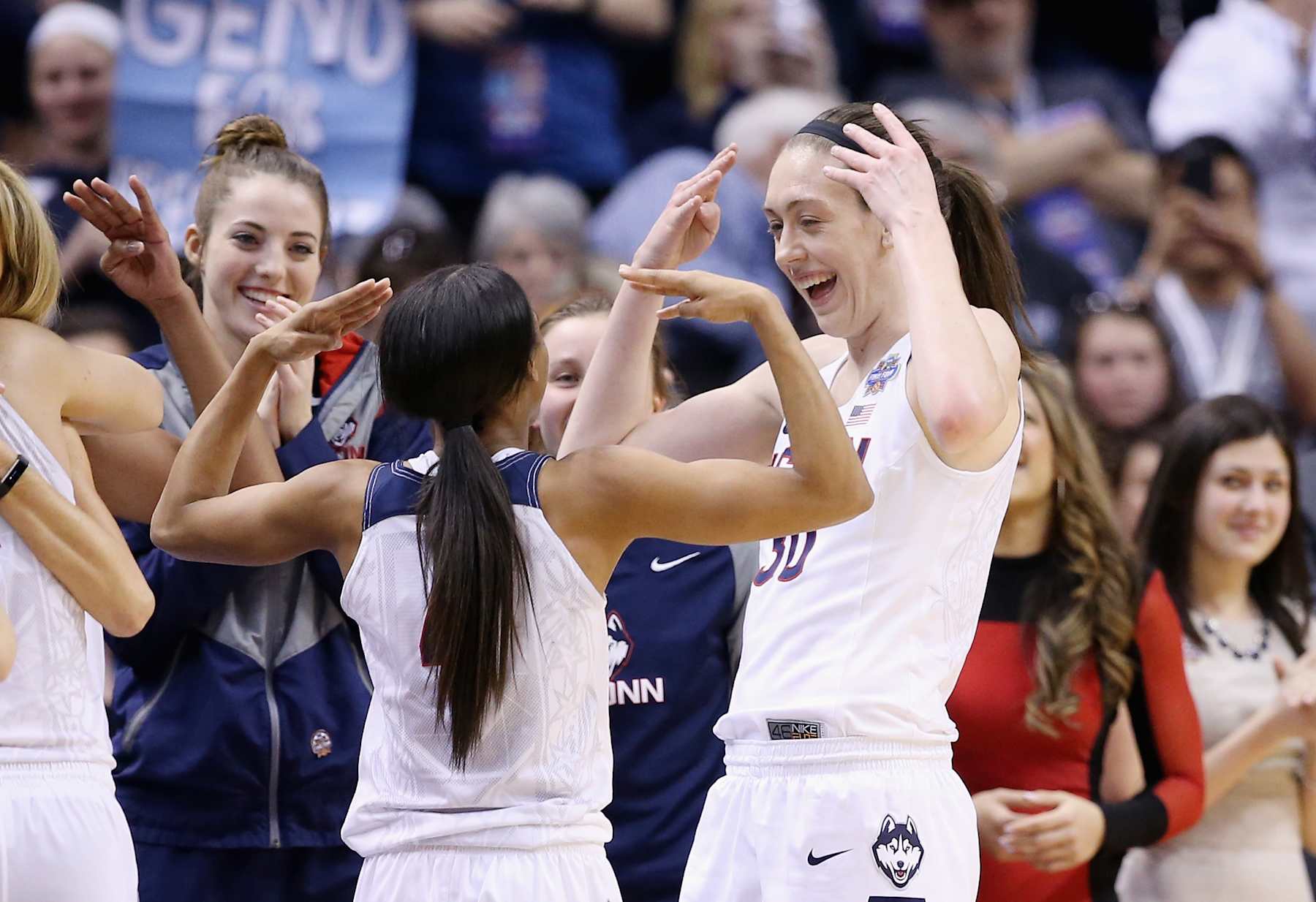 INDIANAPOLIS, IN - APRIL 05:  Breanna Stewart #30 and Moriah Jefferson #4 of the Connecticut Huskies laugh as they take the bench in the fourth quarter against the Syracuse Orange during the championship game of the 2016 NCAA Women's Final Four Basketball Championship at Bankers Life Fieldhouse on April 5, 2016 in Indianapolis, Indiana. Connecticut won 82-51.  (Photo by Andy Lyons/Getty Images)