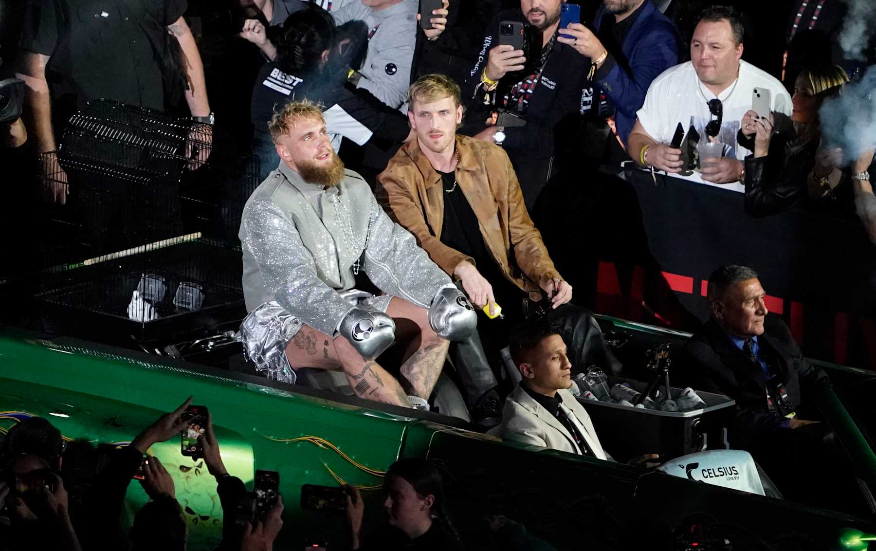 US YouTuber/boxer Jake Paul sits with his brother Logan Paul as he arrives to fight the heavyweight boxing bout against US retired pro-boxer Mike Tyson at The Pavilion at AT&T Stadium in Arlington, Texas, November 15, 2024. (Photo by TIMOTHY A. CLARY / AFP) (Photo by TIMOTHY A. CLARY/AFP via Getty Images)