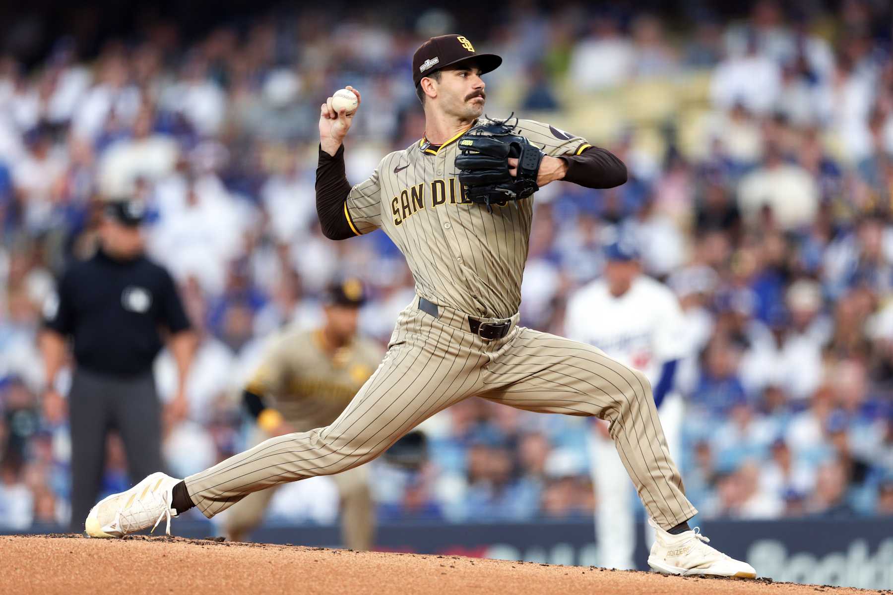 LOS ANGELES, CALIFORNIA - OCTOBER 05: Dylan Cease #84 of the San Diego Padres throws a pitch during the first inning against the Los Angeles Dodgers in Game One of the Division Series at Dodger Stadium on October 05, 2024 in Los Angeles, California.  (Photo by Harry How/Getty Images)