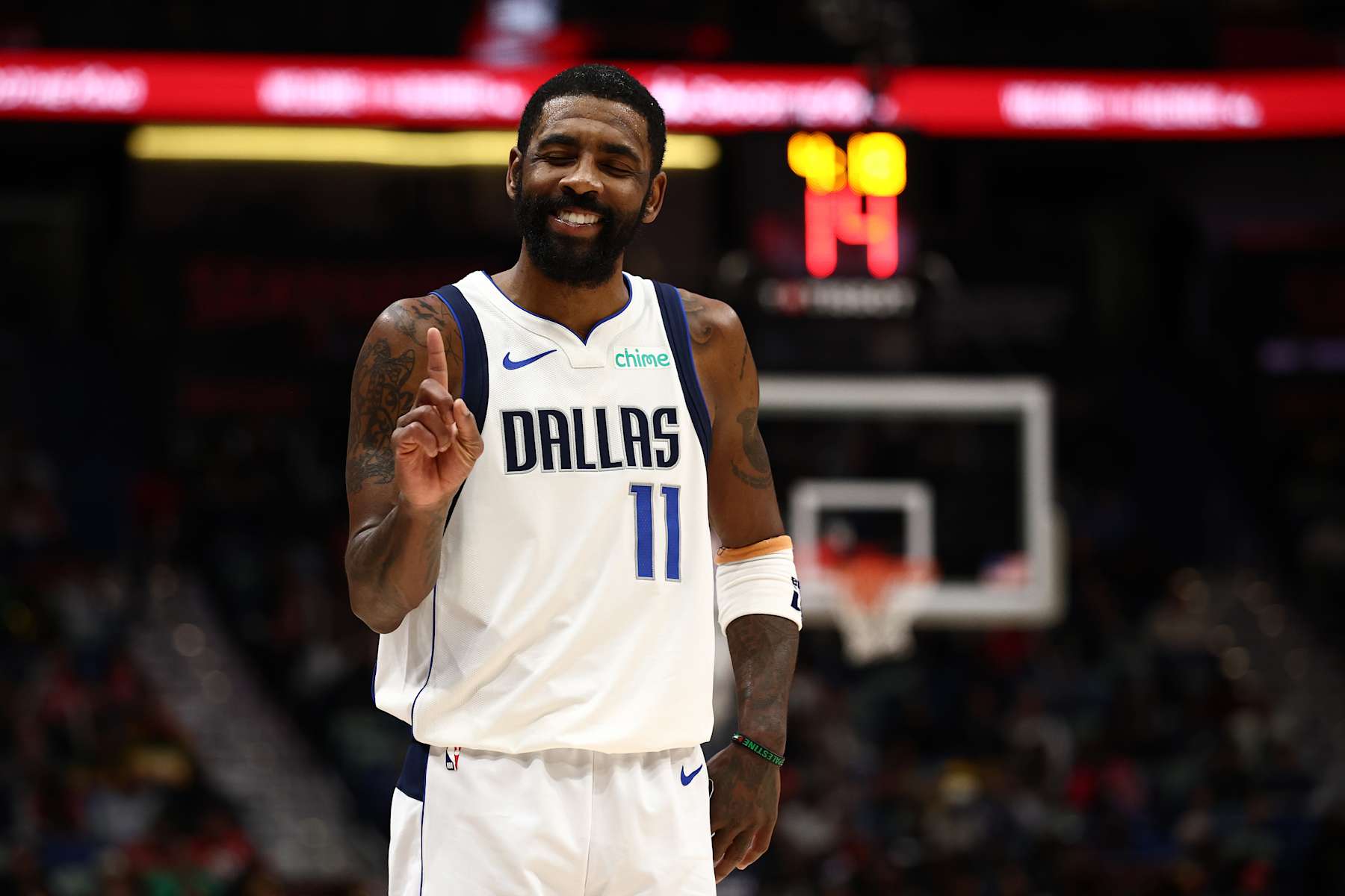 NEW ORLEANS, LOUISIANA - JANUARY 29: Kyrie Irving #11 of the Dallas Mavericks reacts during the game against the New Orleans Pelicans at Smoothie King Center on January 29, 2025 in New Orleans, Louisiana. NOTE TO USER: User expressly acknowledges and agrees that, by downloading and or using this photograph, User is consenting to the terms and conditions of the Getty Images License Agreement. (Photo by Chris Graythen/Getty Images)