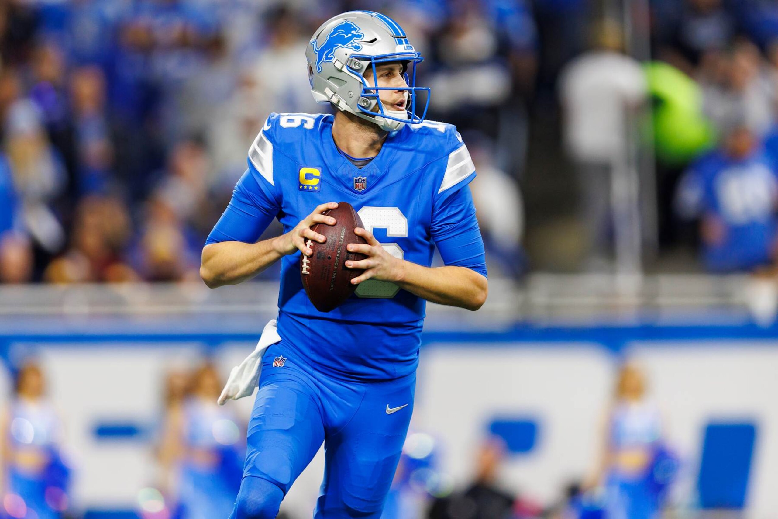 DETROIT, MICHIGAN - JANUARY 18: Quarterback Jared Goff #16 of the Detroit Lions drops back to pass during the second half of the NFC Divisional Playoff game against the Washington Commanders, at Ford Field on January 18, 2025 in Detroit, Michigan. (Photo by Brooke Sutton/Getty Images)