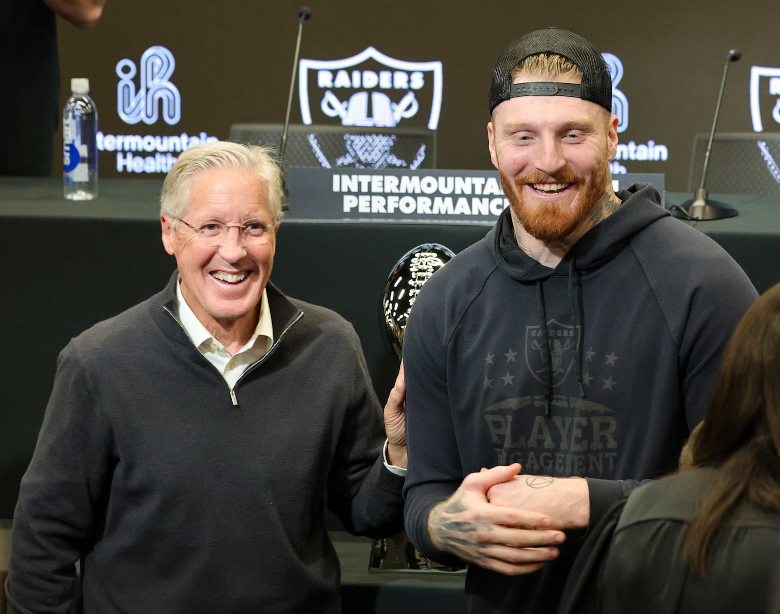 HENDERSON, NEVADA - JANUARY 27: Pete Carroll (L) and defensive end Maxx Crosby of the Las Vegas Raiders talk after a news conference introducing Carroll as the head coach of the Raiders and John Spytek as the team's general manager at the Las Vegas Raiders Headquarters/Intermountain Healthcare Performance Center on January 27, 2025 in Henderson, Nevada. (Photo by Ethan Miller/Getty Images) HENDERSON, NEVADA - JANUARY 27: Pete Carroll (L) and defensive end Maxx Crosby of the Las Vegas Raiders talk after a news conference introducing Carroll as the head coach of the Raiders and John Spytek as the team's general manager at the Las Vegas Raiders Headquarters/Intermountain Healthcare Performance Center on January 27, 2025 in Henderson, Nevada. (Photo by Ethan Miller/Getty Images)