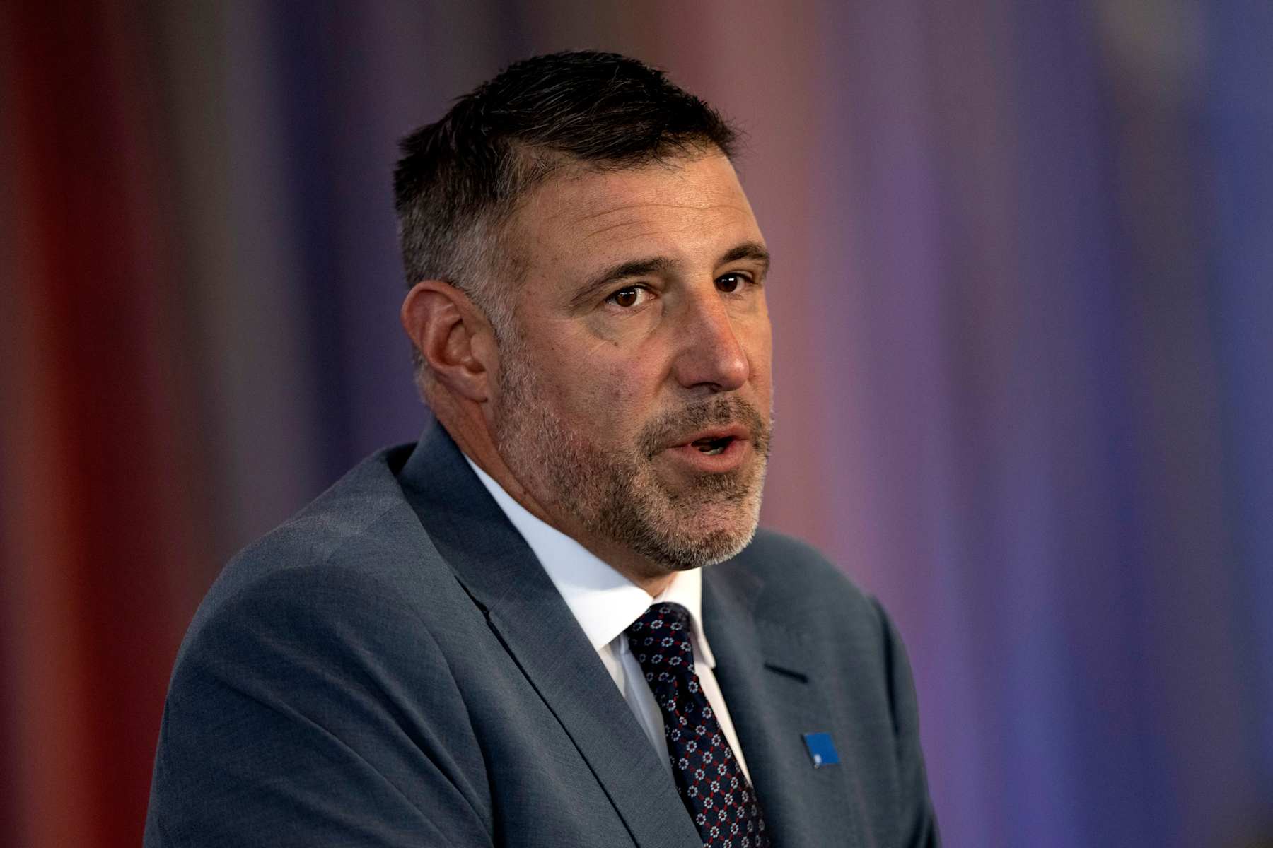 FOXBOROUGH, MASSACHUSETTS - JANUARY 13: Mike Vrabel speaks as he is introduced as head coach of the New England Patriots during a press conference at Gillette Stadium on January 13, 2025 in Foxborough, Massachusetts.  (Photo by Billie Weiss/Getty Images)