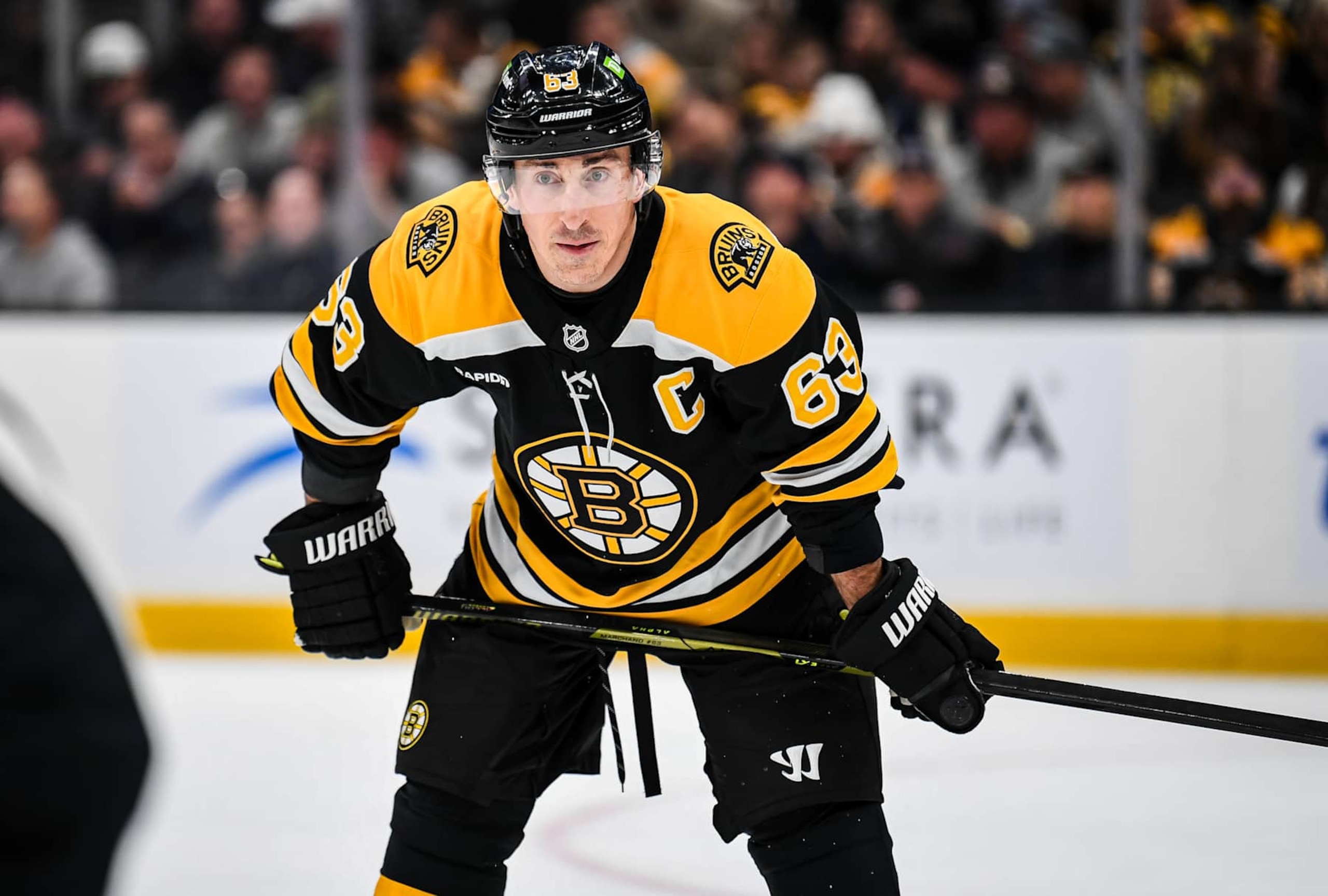 BOSTON, MASSACHUSETTS - JANUARY 30: Brad Marchand #63 of the Boston Bruins waits for a face off during the first period against the Winnipeg Jets at TD Garden on January 30, 2025 in Boston, Massachusetts. (Photo by China Wong/NHLI via Getty Images)