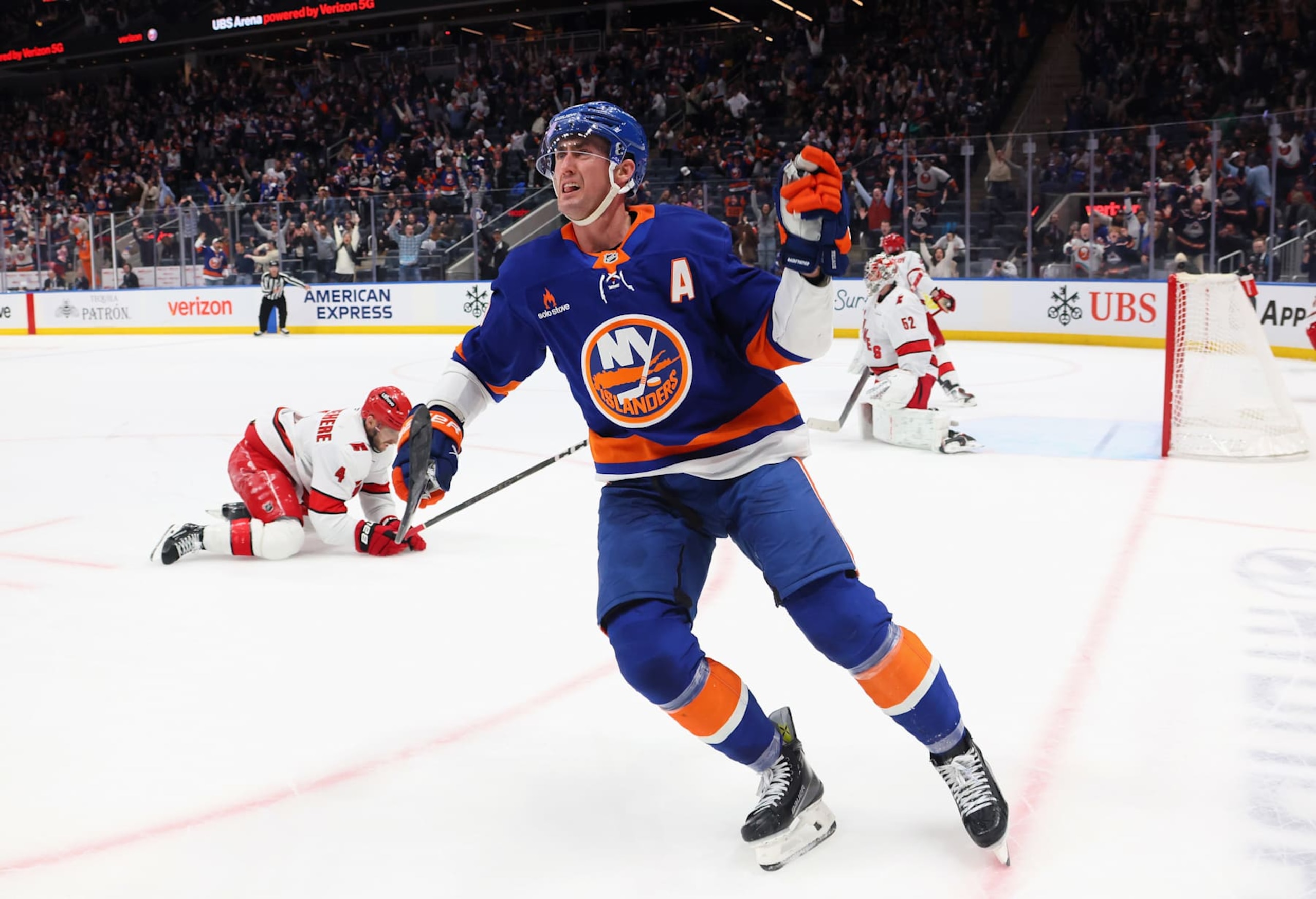 ELMONT, NEW YORK - JANUARY 25: Brock Nelson #29 of the New York Islanders scores the game-winning goal in overtime against the Carolina Hurricanes at UBS Arena on January 25, 2025 in Elmont, New York. The Islanders defeated the Hurricanes 3-2 in overtime. (Photo by Bruce Bennett/Getty Images)