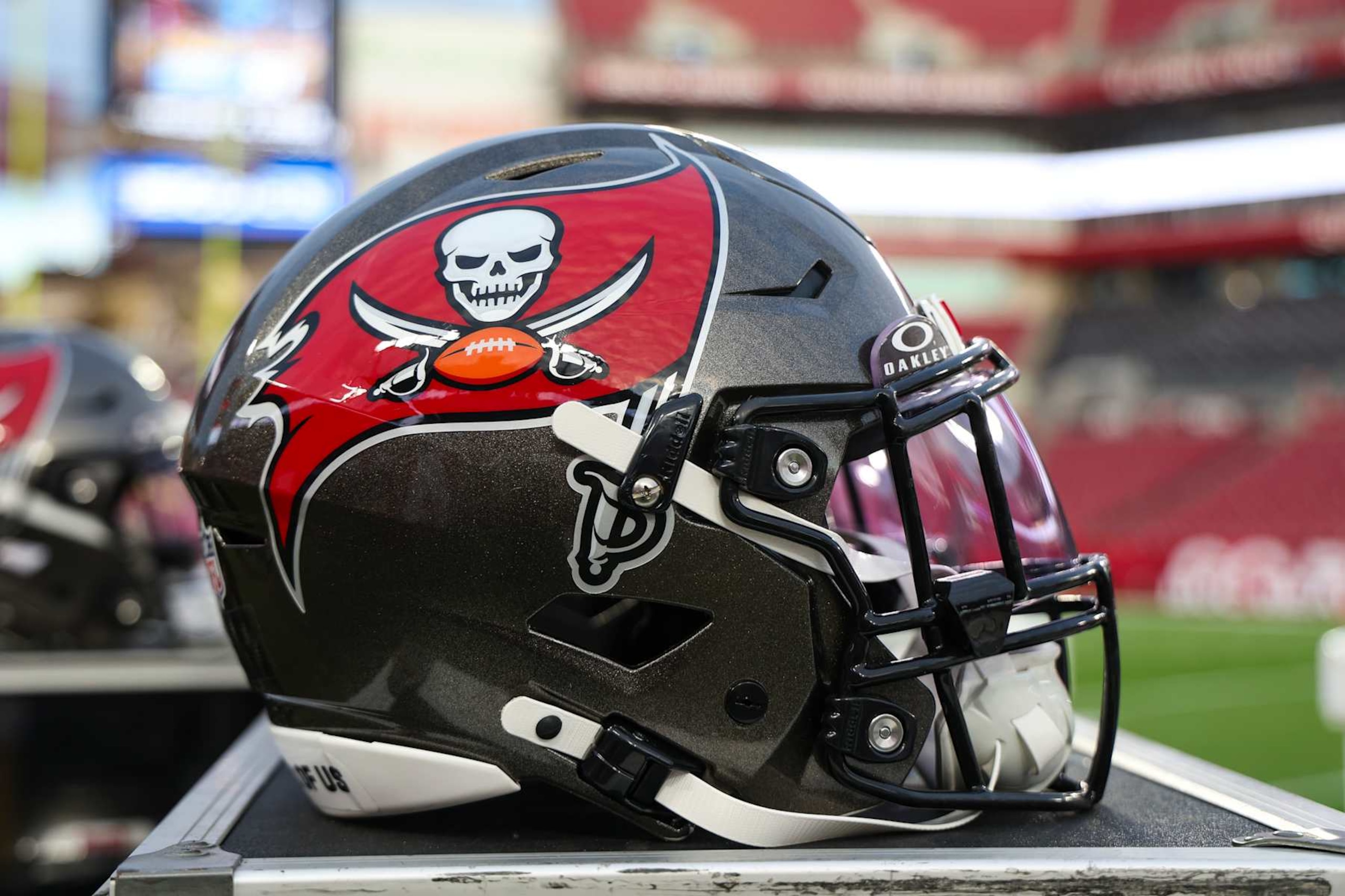 TAMPA, FLORIDA - JANUARY 12: Detail view of a Tampa Bay Buccaneers helmet prior to an NFL football wild card playoff game between the Washington Commanders and the Tampa Bay Buccaneers at Raymond James Stadium on January 12, 2025 in Tampa, Florida. (Photo by Perry Knotts/Getty Images) TAMPA, FLORIDA - JANUARY 12: Detail view of a Tampa Bay Buccaneers helmet prior to an NFL football wild card playoff game between the Washington Commanders and the Tampa Bay Buccaneers at Raymond James Stadium on January 12, 2025 in Tampa, Florida. (Photo by Perry Knotts/Getty Images)