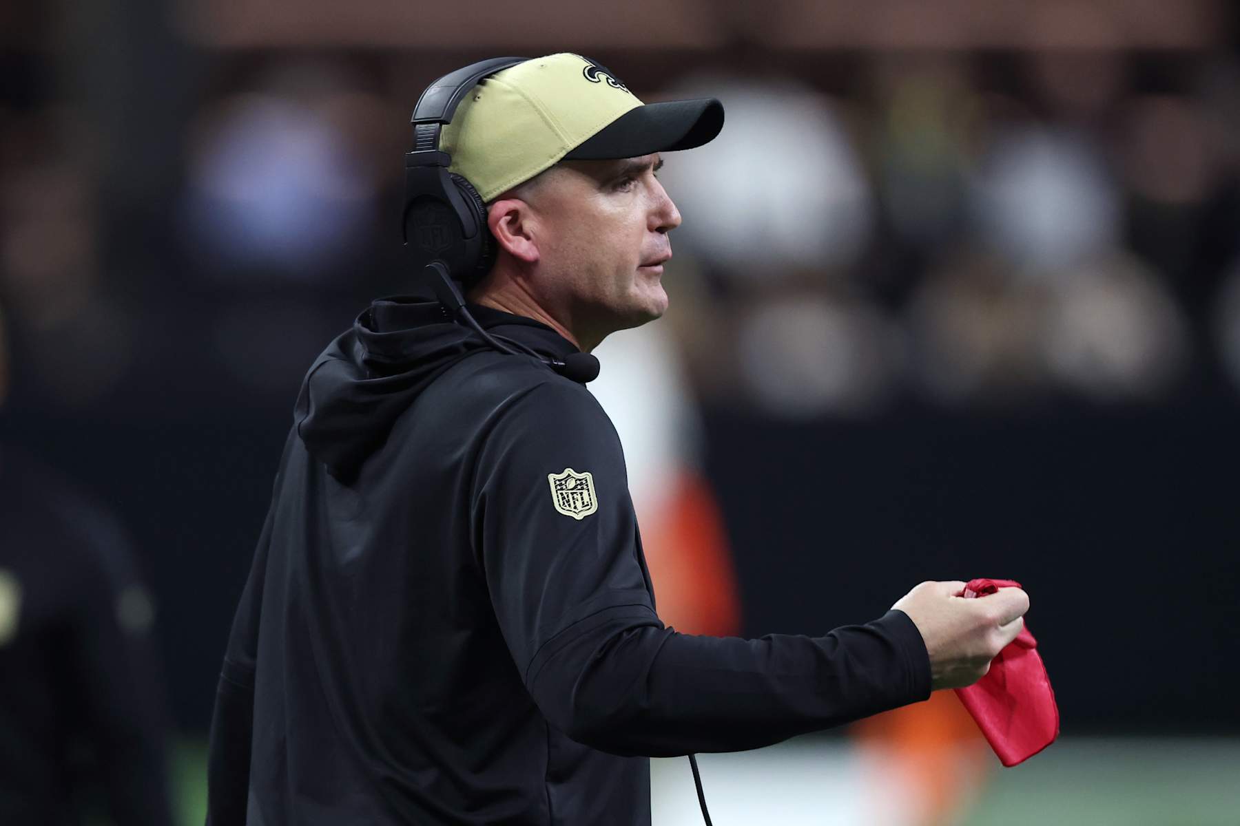 NEW ORLEANS, LOUISIANA - DECEMBER 29: Darren Rizzi head coach of the New Orleans Saints challenges a play during the first quarter against the Las Vegas Raiders at Caesars Superdome on December 29, 2024 in New Orleans, Louisiana. (Photo by Chris Graythen/Getty Images)