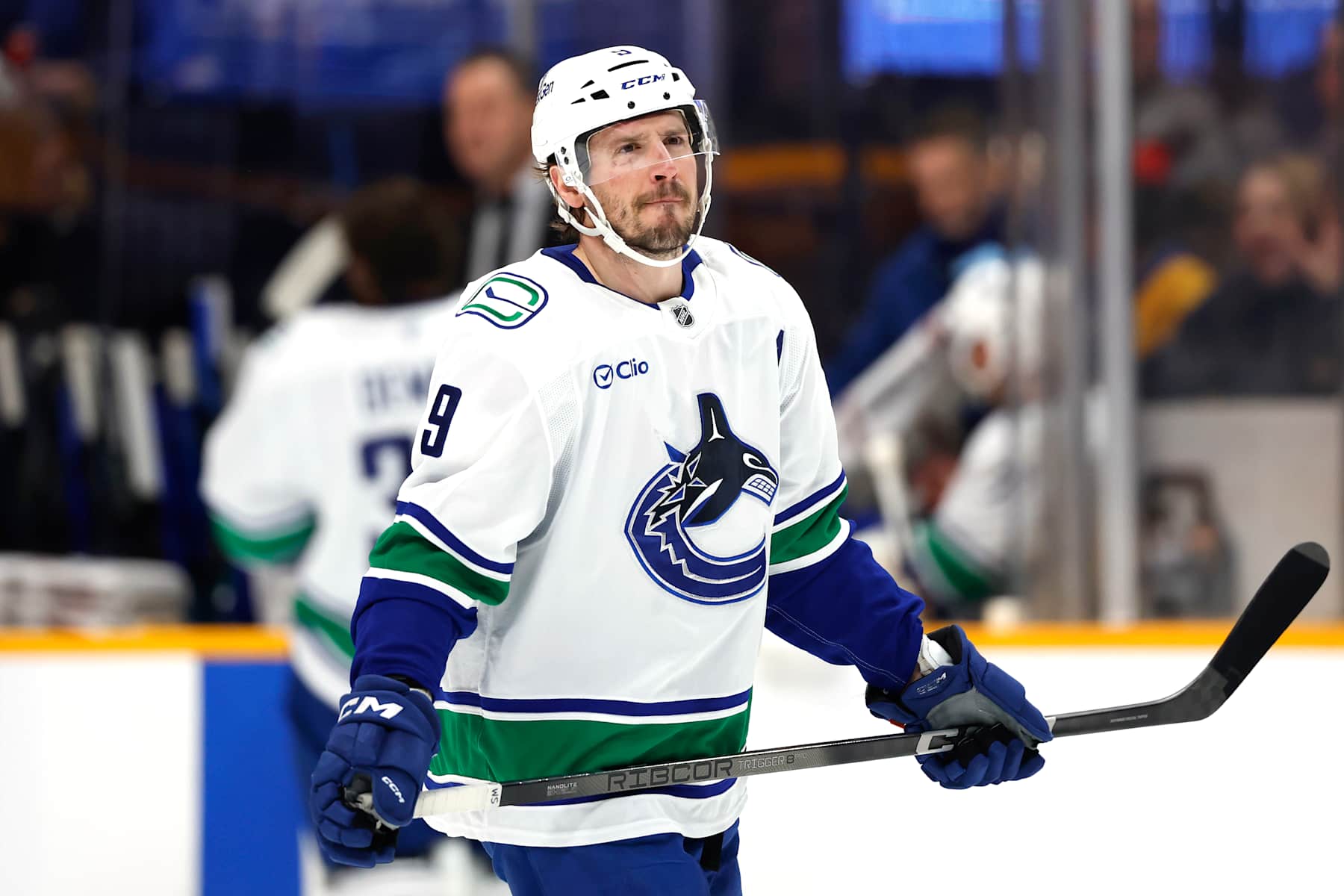 NASHVILLE, TENNESSEE - JANUARY 29: J.T. Miller #9 of the Vancouver Canucks looks on before the game against the Nashville Predators at Bridgestone Arena on January 29, 2025 in Nashville, Tennessee. (Photo by Johnnie Izquierdo/Getty Images)