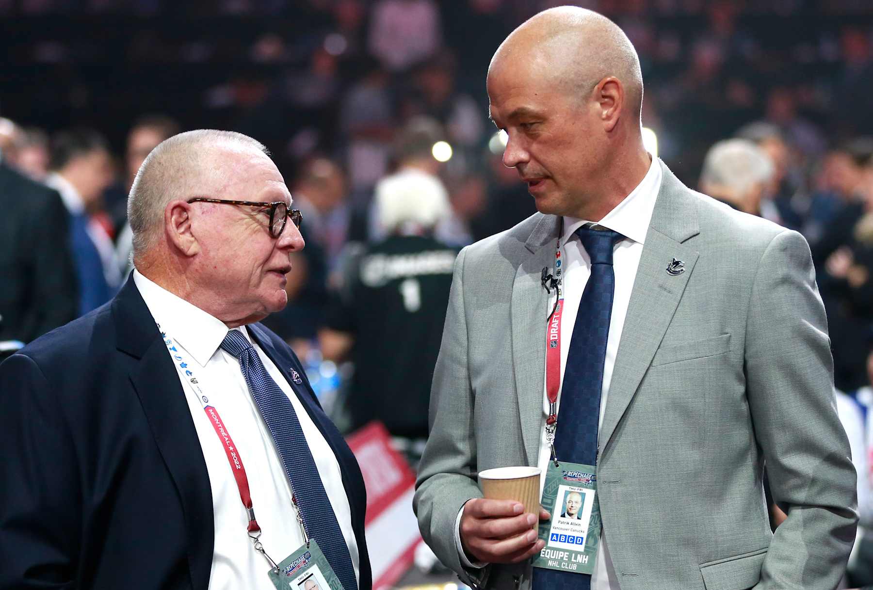 MONTREAL, QUEBEC - JULY 07: (L-R) President of hockey operations Jim Rutherford and general manager Patrik Allvin of the Vancouver Canucks look on prior to the first round of the 2022 Upper Deck NHL Draft at Bell Centre on July 07, 2022 in Montreal, Quebec. (Photo by Jeff Vinnick/NHLI via Getty Images)