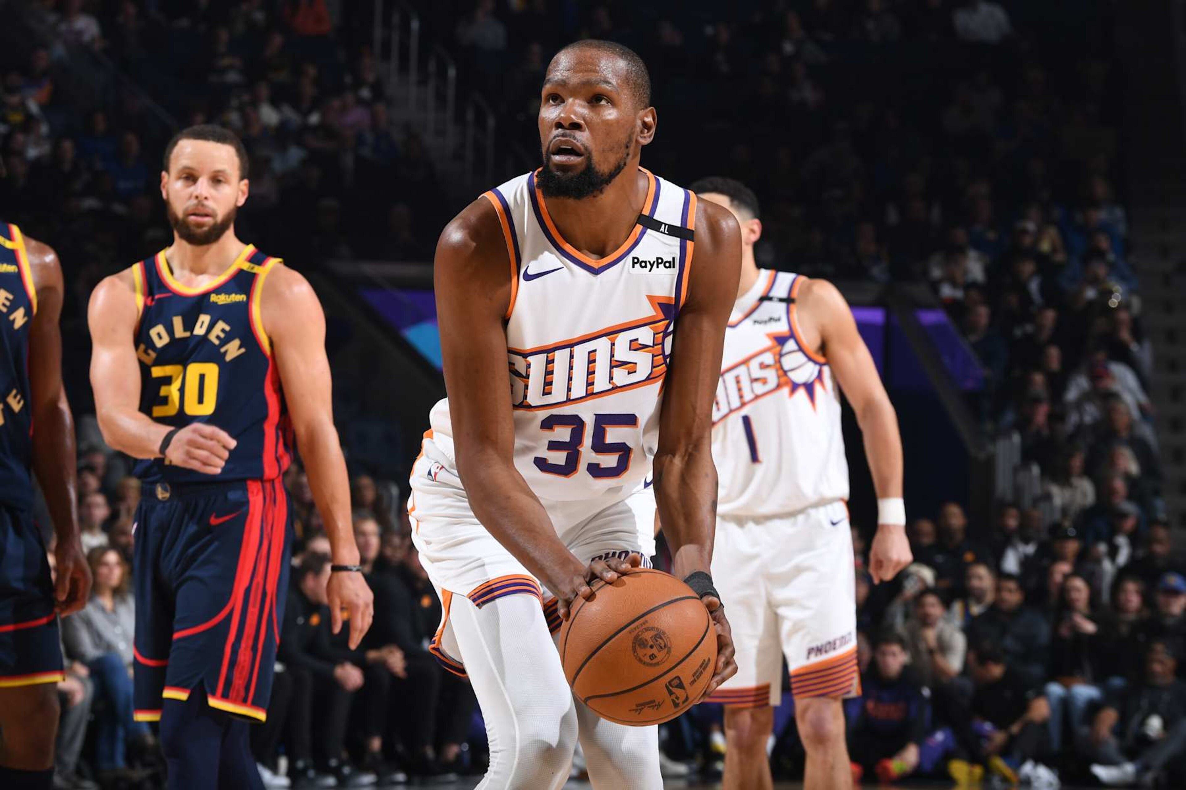 SAN FRANCISCO, CA - JANUARY 31:  Kevin Durant #35 of the Phoenix Suns shoots a free throw during the game against the Golden State Warriors on January 31, 2025 at Chase Center in San Francisco, California. NOTE TO USER: User expressly acknowledges and agrees that, by downloading and or using this photograph, user is consenting to the terms and conditions of Getty Images License Agreement. Mandatory Copyright Notice: Copyright 2025 NBAE (Photo by Noah Graham/NBAE via Getty Images)