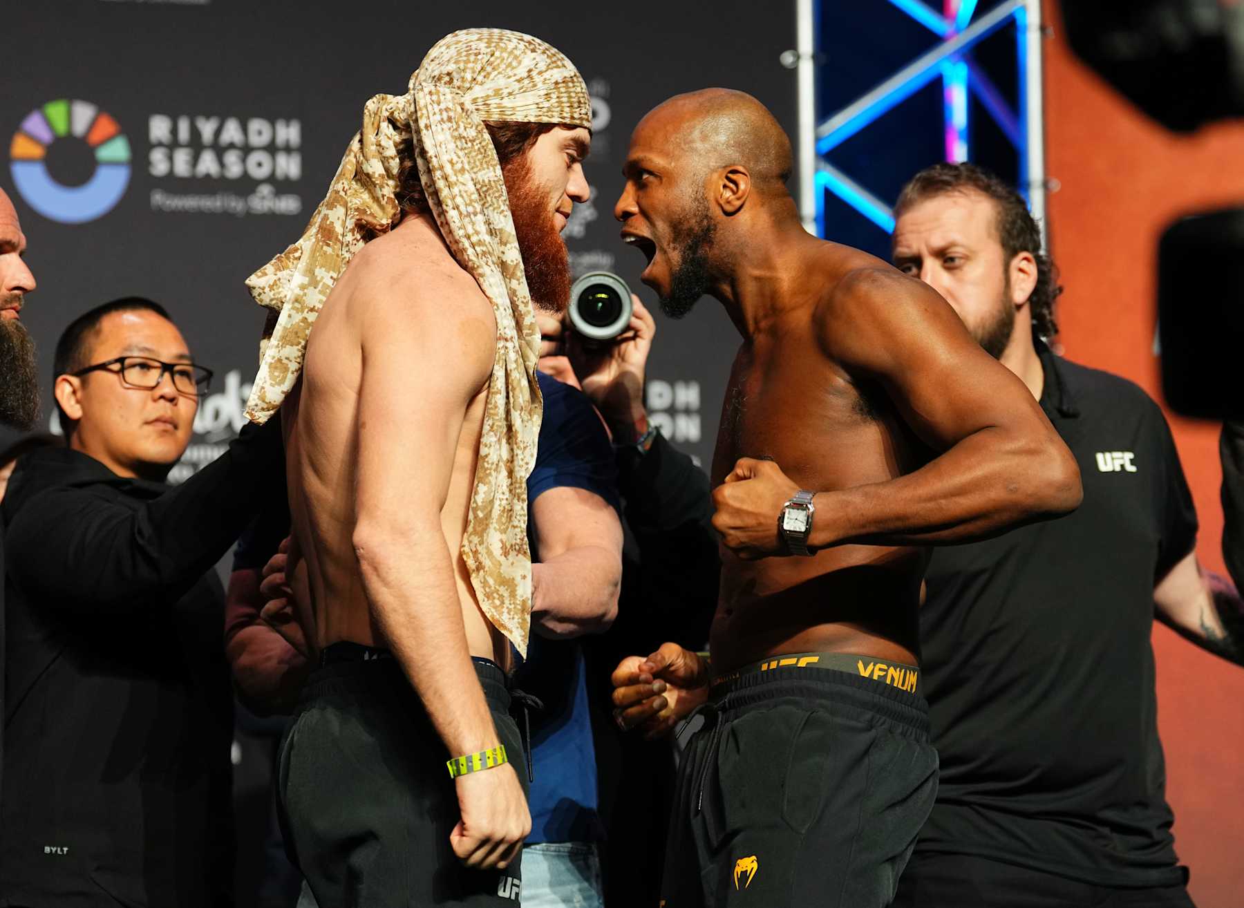 Opponents Shara Magomedov (left) and Michael Page face off 