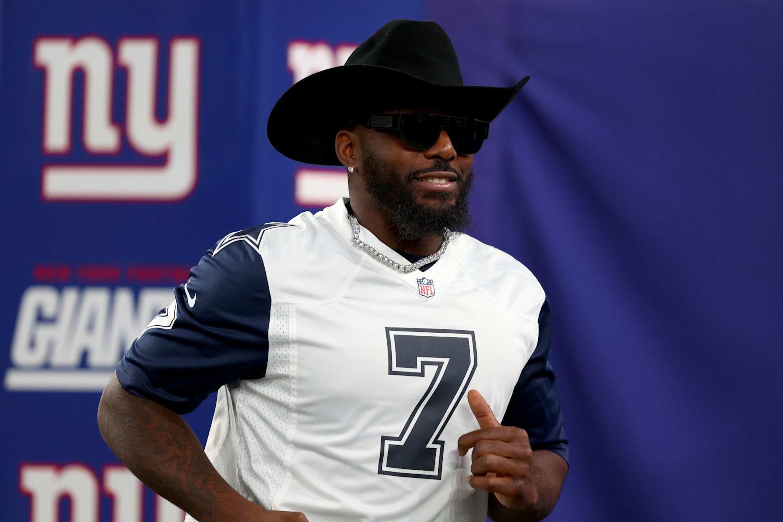 EAST RUTHERFORD, NEW JERSEY - SEPTEMBER 26: Former Dallas Cowboys wide receiver Dez Bryant looks on prior to the game between the Dallas Cowboys and the New York Giants at MetLife Stadium on September 26, 2022 in East Rutherford, New Jersey. (Photo by Elsa/Getty Images) EAST RUTHERFORD, NEW JERSEY - SEPTEMBER 26: Former Dallas Cowboys wide receiver Dez Bryant looks on prior to the game between the Dallas Cowboys and the New York Giants at MetLife Stadium on September 26, 2022 in East Rutherford, New Jersey. (Photo by Elsa/Getty Images)