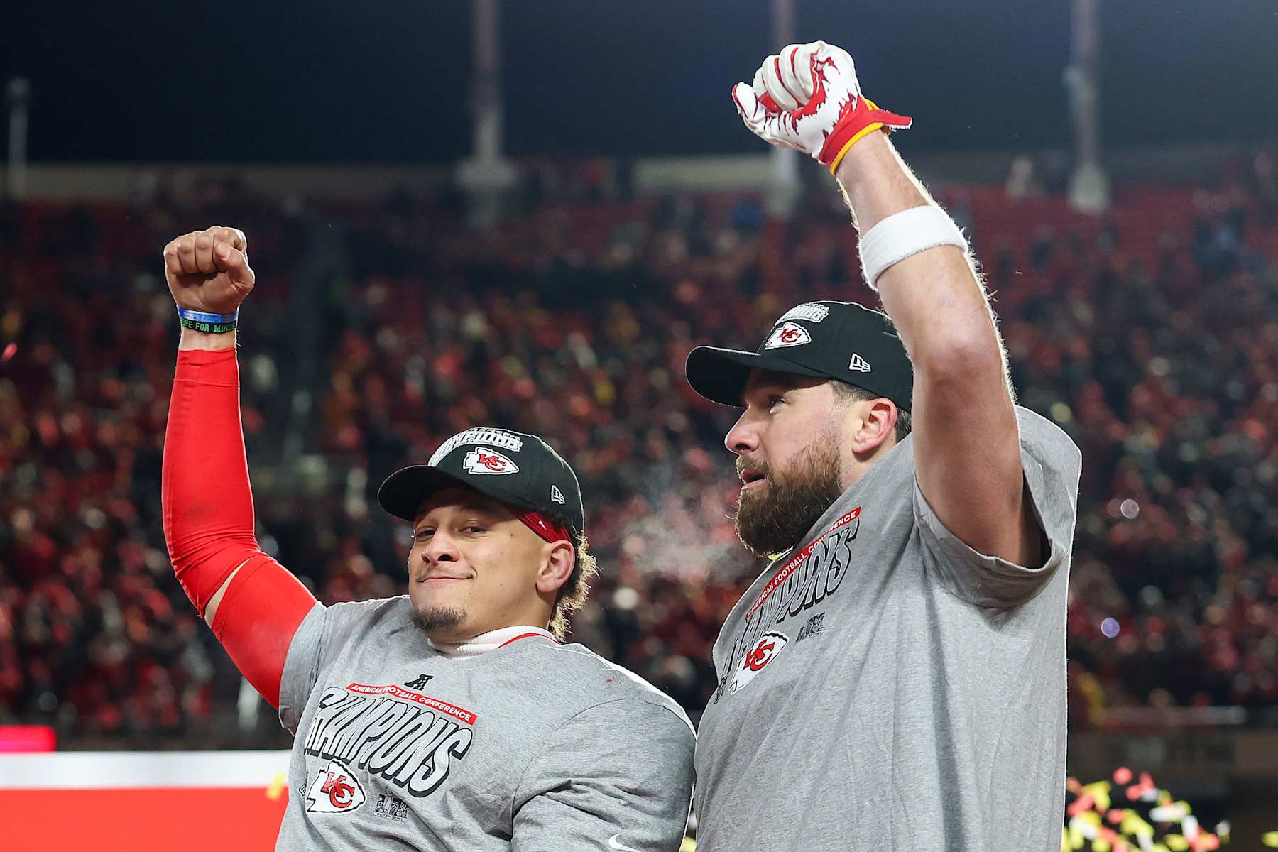 KANSAS CITY, MISSOURI - JANUARY 26: Patrick Mahomes #15 and Travis Kelce #87 of the Kansas City Chiefs celebrate after defeating the Buffalo Bills 32-29 in the AFC Championship Game at GEHA Field at Arrowhead Stadium on January 26, 2025 in Kansas City, Missouri.  (Photo by Jamie Squire/Getty Images)