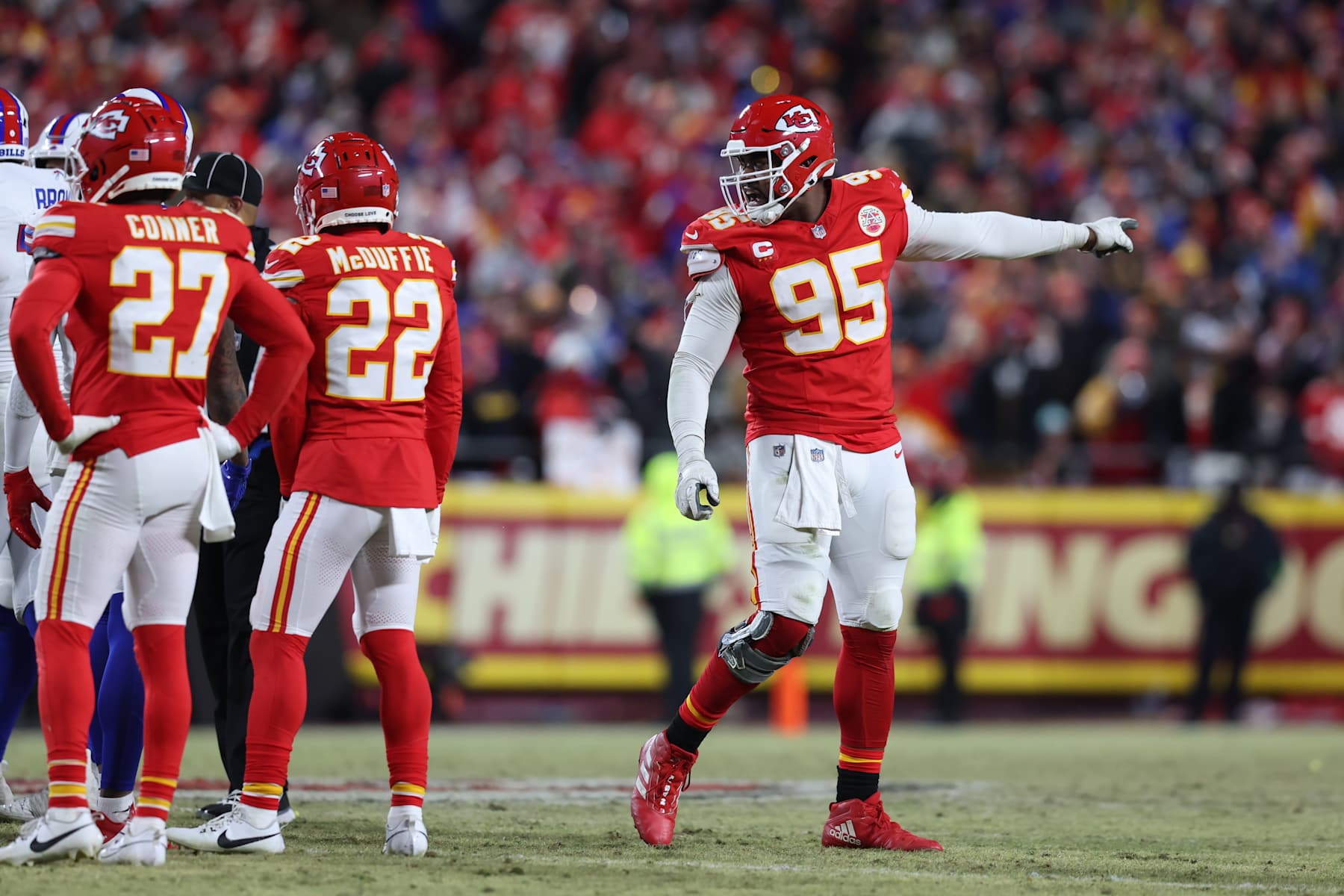 KANSAS CITY, MO - JANUARY 26: Kansas City Chiefs defensive tackle Chris Jones (95) points to indicate Chiefs ball after holding Buffalo Bills quarterback Josh Allen (17) just short of the line of gain on a critical fourth down in the fourth quarter of the AFC Championship game between the Buffalo Bills and Kansas City Chiefs on January 26, 2025 at GEHA Field at Arrowhead Stadium in Kansas City, MO. (Photo by Scott Winters/Icon Sportswire via Getty Images)