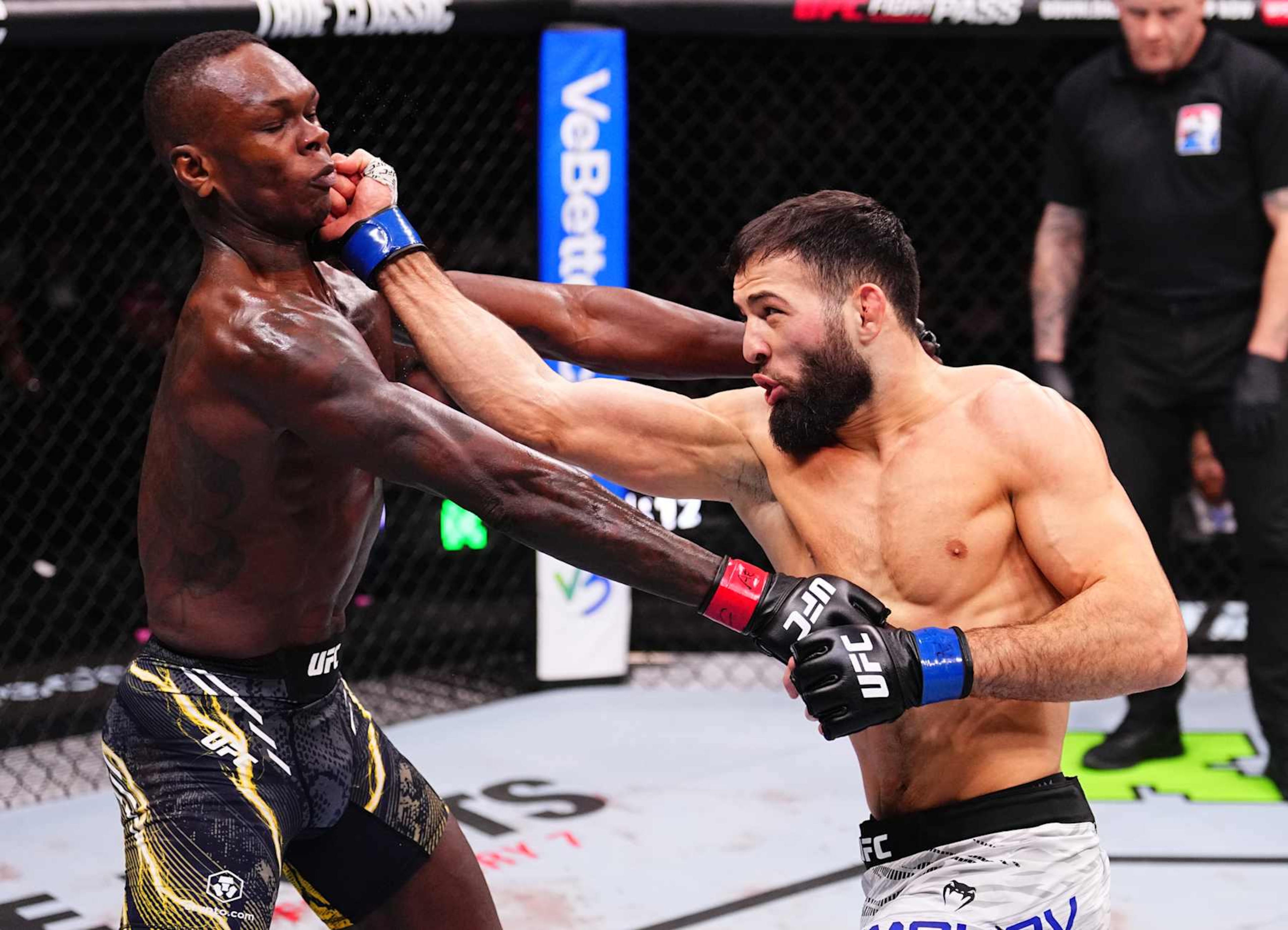 RIYADH, SAUDI ARABIA - FEBRUARY 01: (R-L) Nassourdine Imavov of Russia punches Israel Adesanya of Nigeria in a middleweight fight during the UFC Fight Night event at anb Arena on February 01, 2025 in Riyadh, Saudi Arabia. (Photo by Chris Unger/Zuffa LLC) RIYADH, SAUDI ARABIA - FEBRUARY 01: (R-L) Nassourdine Imavov of Russia punches Israel Adesanya of Nigeria in a middleweight fight during the UFC Fight Night event at anb Arena on February 01, 2025 in Riyadh, Saudi Arabia. (Photo by Chris Unger/Zuffa LLC)