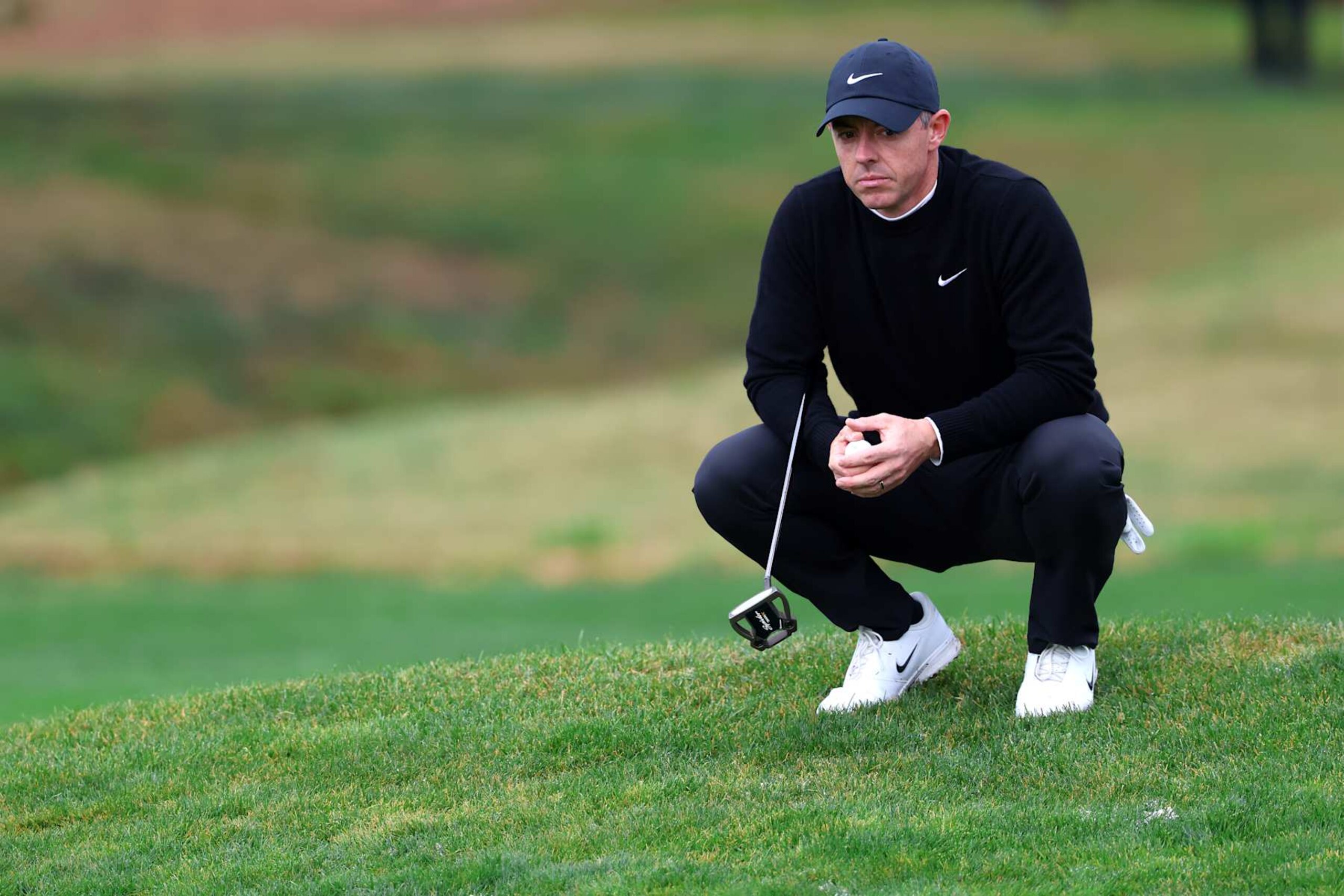 PEBBLE BEACH, CALIFORNIA - FEBRUARY 01: Rory McIlroy of Northern Ireland lines up a putt on the second green during the third round of the AT&T Pebble Beach Pro-Am 2025 at Pebble Beach Golf Links on February 01, 2025 in Pebble Beach, California. (Photo by Jed Jacobsohn/Getty Images)