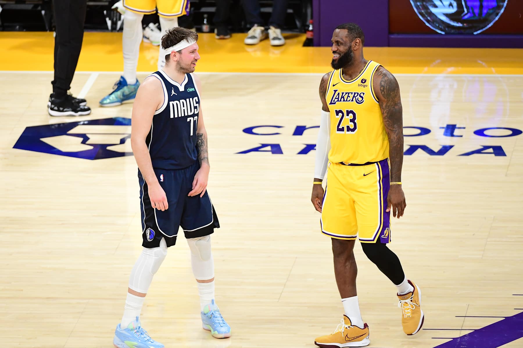 LOS ANGELES, CA - JANUARY 17: LeBron James #23 of the Los Angeles Lakers and Luka Doncic #77 of the Dallas Mavericks look on during the game on January 17, 2024 at Crypto.Com Arena in Los Angeles, California. NOTE TO USER: User expressly acknowledges and agrees that, by downloading and/or using this Photograph, user is consenting to the terms and conditions of the Getty Images License Agreement. Mandatory Copyright Notice: Copyright 2024 NBAE (Photo by Adam Pantozzi/NBAE via Getty Images)