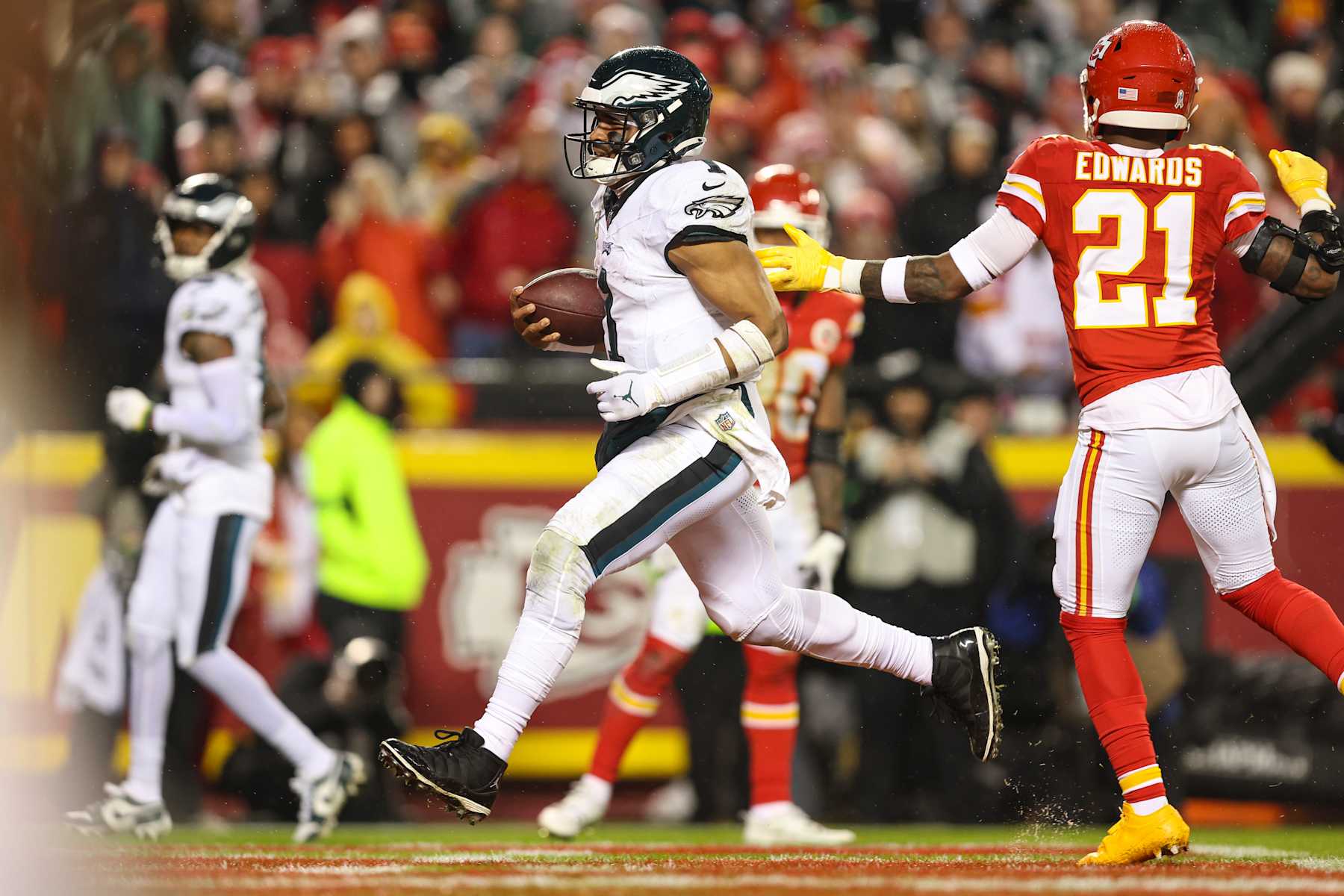 KANSAS CITY, MO - NOVEMBER 20: Jalen Hurts #1 of the Philadelphia Eagles runs the ball for a touchdown during an NFL football game against the Kansas City Chiefs at GEHA Field at Arrowhead Stadium on November 20, 2023 in Kansas City, Missouri. (Photo by Perry Knotts/Getty Images)