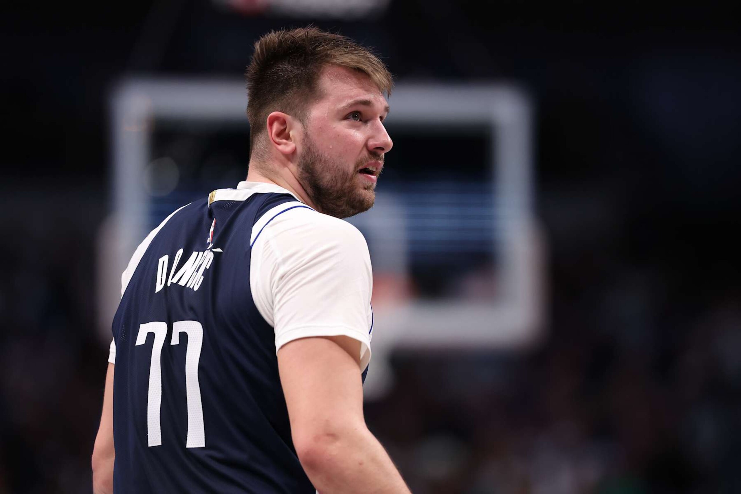 DALLAS, TEXAS - DECEMBER 23: Luka Doncic #77 of the Dallas Mavericks looks on during the second half against the Portland Trail Blazers at American Airlines Center on December 23, 2024 in Dallas, Texas. NOTE TO USER: User expressly acknowledges and agrees that, by downloading and/or using this photograph, user is consenting to the terms and conditions of the Getty Images License Agreement. (Photo by Sam Hodde/Getty Images) DALLAS, TEXAS - DECEMBER 23: Luka Doncic #77 of the Dallas Mavericks looks on during the second half against the Portland Trail Blazers at American Airlines Center on December 23, 2024 in Dallas, Texas. NOTE TO USER: User expressly acknowledges and agrees that, by downloading and/or using this photograph, user is consenting to the terms and conditions of the Getty Images License Agreement. (Photo by Sam Hodde/Getty Images)