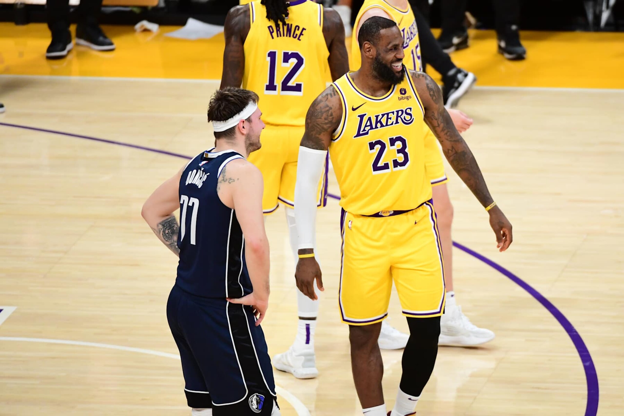 LOS ANGELES, CA - JANUARY 17: LeBron James #23 of the Los Angeles Lakers talks with Luka Doncic #77 of the Dallas Mavericks during the game on January 17, 2024 at Crypto.Com Arena in Los Angeles, California. NOTE TO USER: User expressly acknowledges and agrees that, by downloading and/or using this Photograph, user is consenting to the terms and conditions of the Getty Images License Agreement. Mandatory Copyright Notice: Copyright 2024 NBAE (Photo by Adam Pantozzi/NBAE via Getty Images)