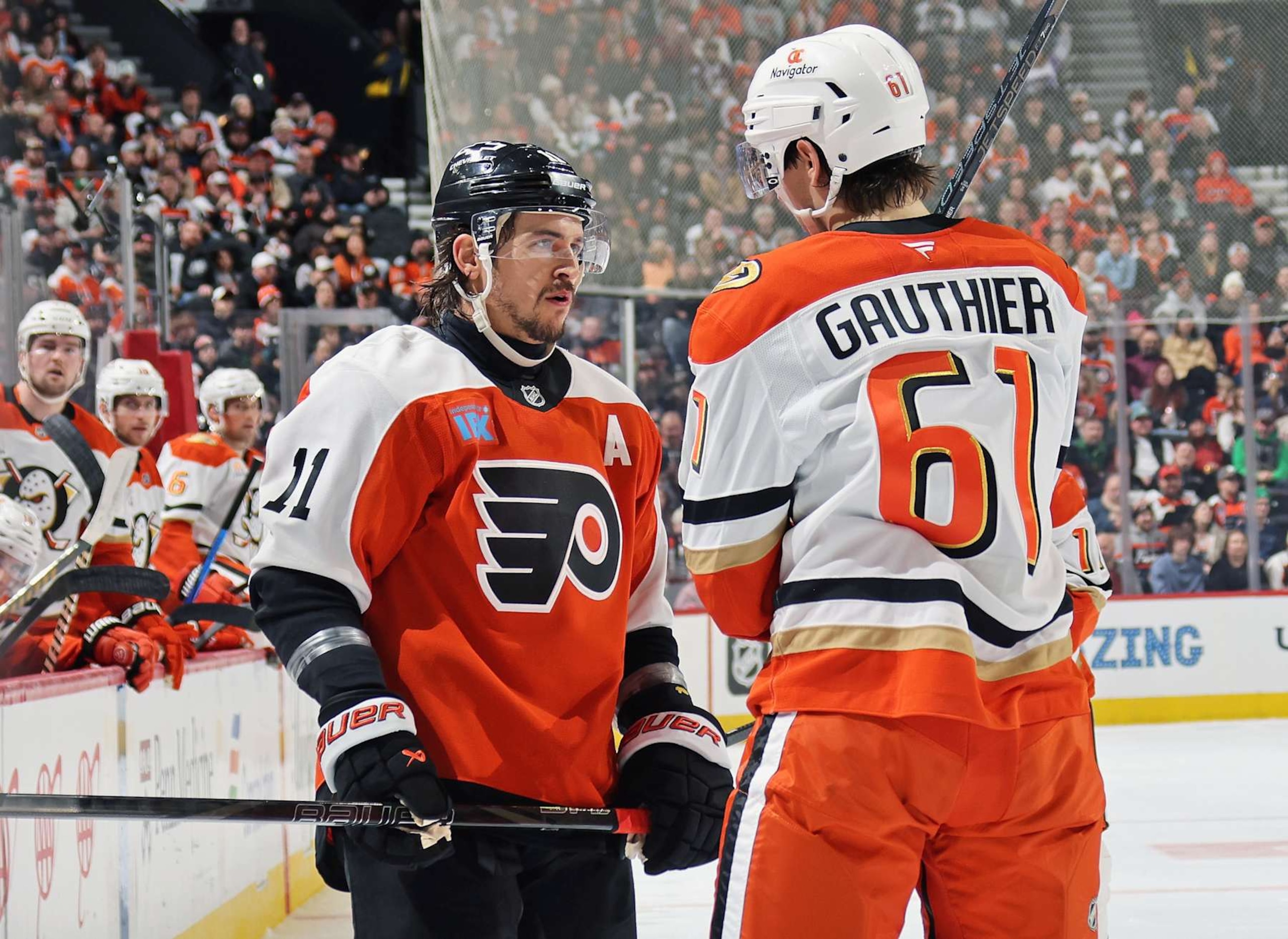 PHILADELPHIA, PENNSYLVANIA - JANUARY 11: Travis Konecny #11 of the Philadelphia Flyers stares down Cutter Gauthier #61 of the Anaheim Ducks during the second period at the Wells Fargo Center on January 11, 2025 in Philadelphia, Pennsylvania.  (Photo by Len Redkoles/NHLI via Getty Images)