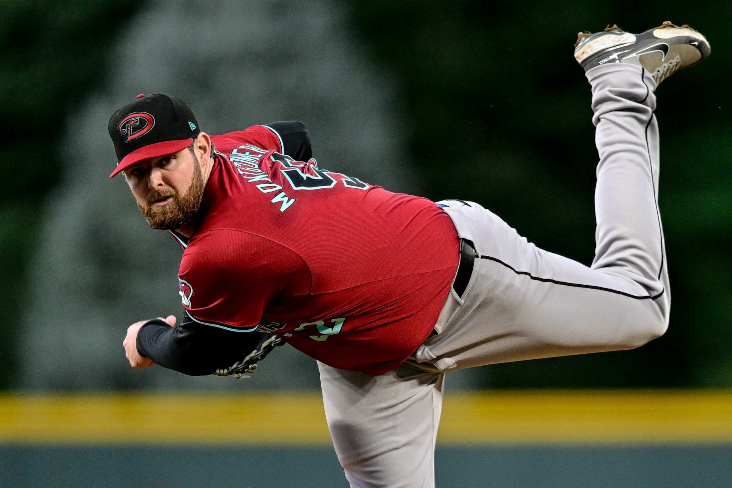 DENVER, COLORADO - SEPTEMBER 17: Jordan Montgomery #52 of the Arizona Diamondbacks pitches in the first inning against the Arizona Diamondbacks at Coors Field on September 17, 2024 in Denver, Colorado. (Photo by Dustin Bradford/Getty Images)