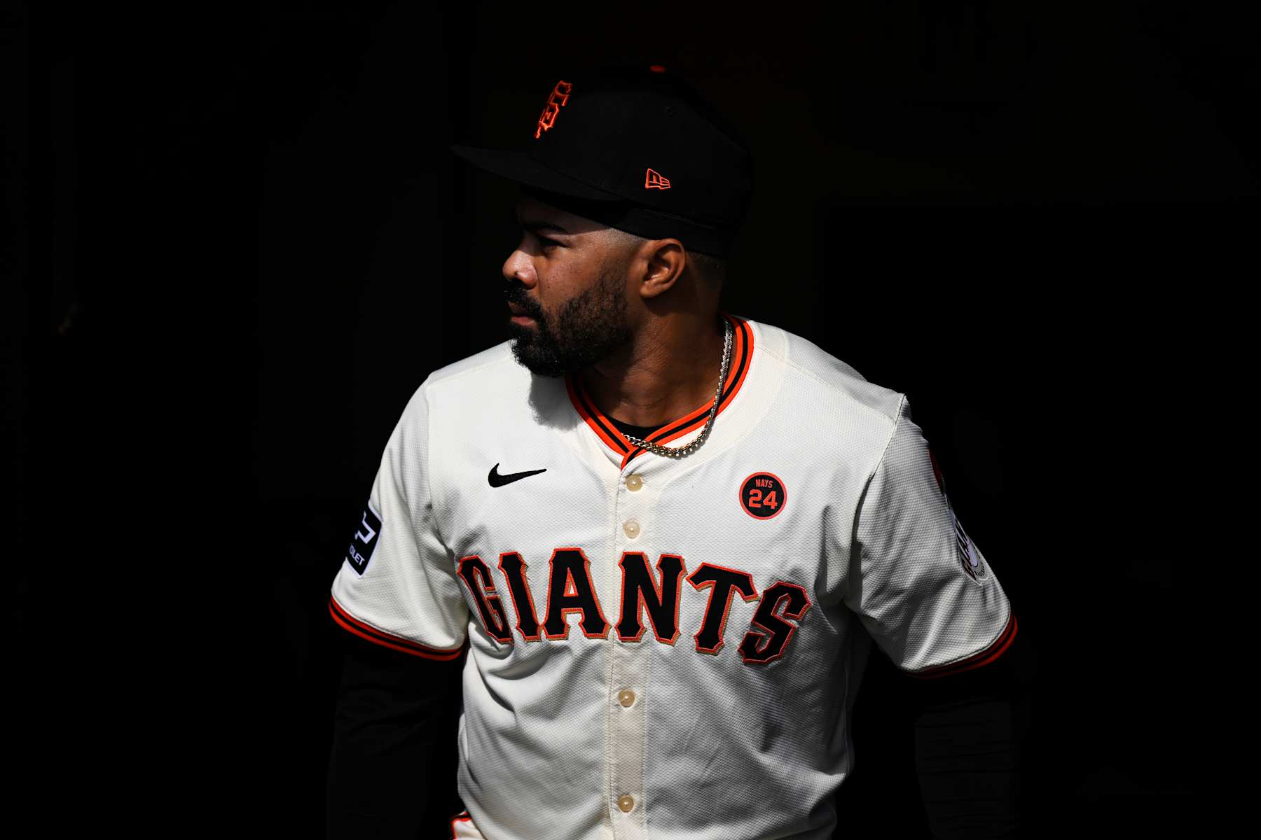 SAN FRANCISCO, CALIFORNIA - SEPTEMBER 29: LaMonte Wade Jr. #31 of the San Francisco Giants stands in the dugout before their game against the St. Louis Cardinals at Oracle Park on September 29, 2024 in San Francisco, California. (Photo by Eakin Howard/Getty Images)