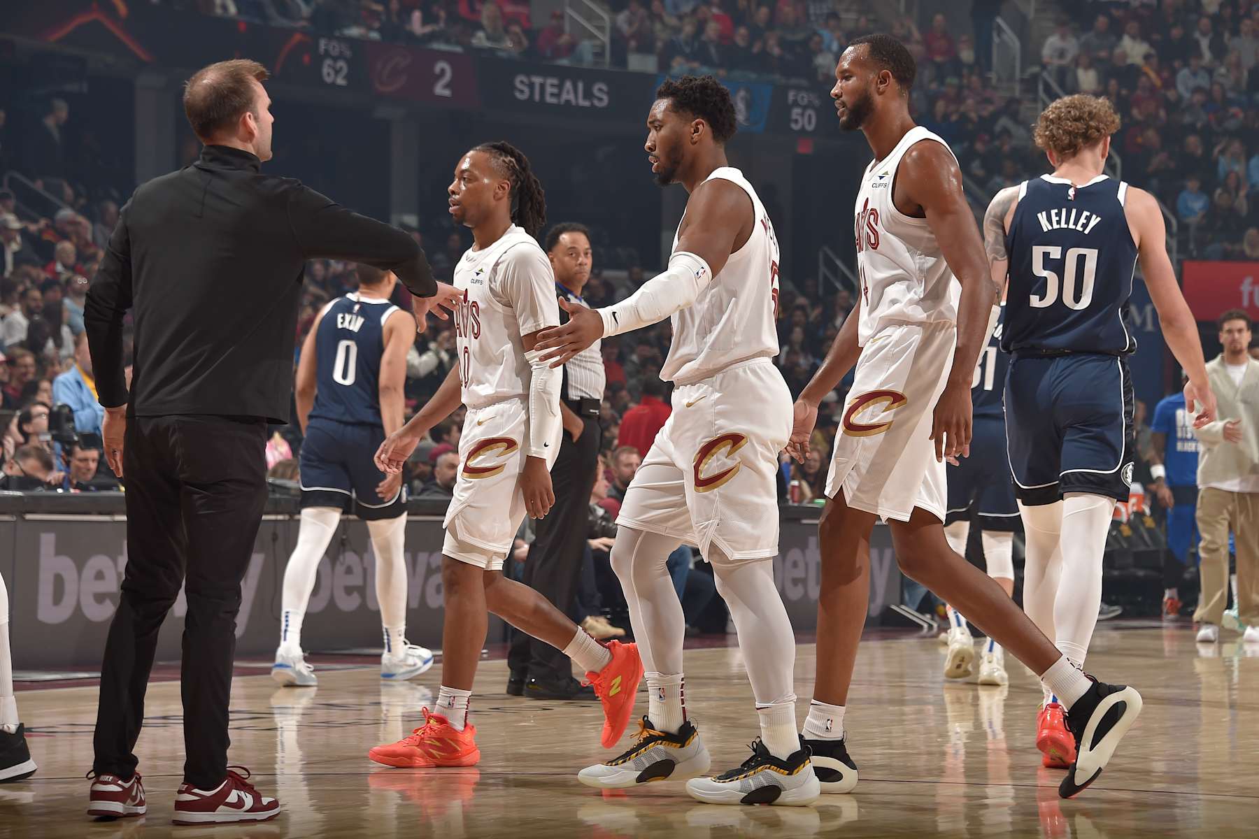 Darius Garland, Donovan Mitchell and Evan Mobley
