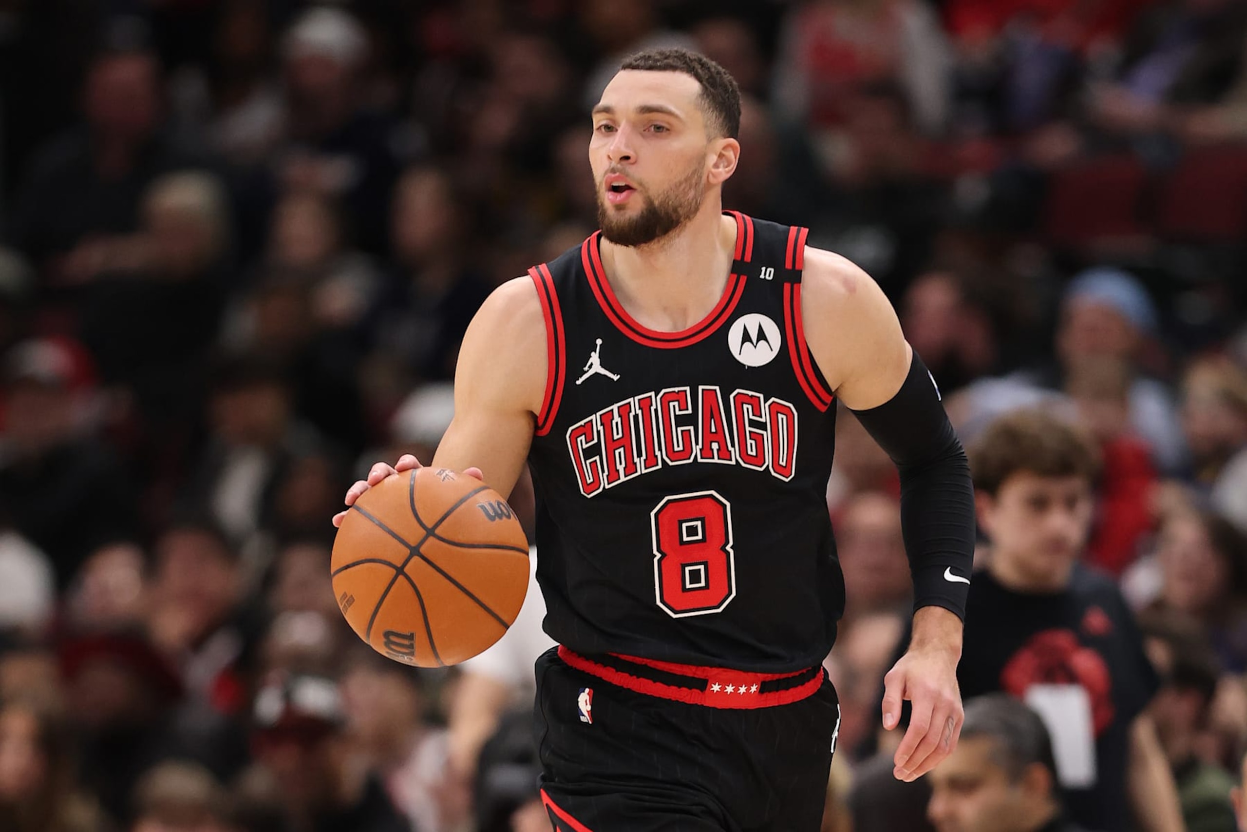 CHICAGO, ILLINOIS - JANUARY 27: Zach LaVine #8 of the Chicago Bulls dribbles up the court against the Denver Nuggets during the second half at the United Center on January 27, 2025 in Chicago, Illinois. NOTE TO USER: User expressly acknowledges and agrees that, by downloading and or using this photograph, User is consenting to the terms and conditions of the Getty Images License Agreement.  (Photo by Michael Reaves/Getty Images)