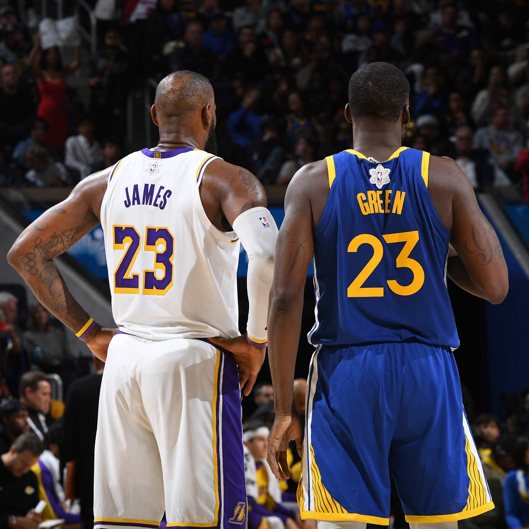 SAN FRANCISCO, CA - DECEMBER 25: LeBron James #23 of the Los Angeles Lakers and Draymond Green #23 of the Golden State Warriors look on during the game on December 25, 2024 at Chase Center in San Francisco, California. NOTE TO USER: User expressly acknowledges and agrees that, by downloading and or using this photograph, user is consenting to the terms and conditions of Getty Images License Agreement. Mandatory Copyright Notice: Copyright 2024 NBAE (Photo by Noah Graham/NBAE via Getty Images)