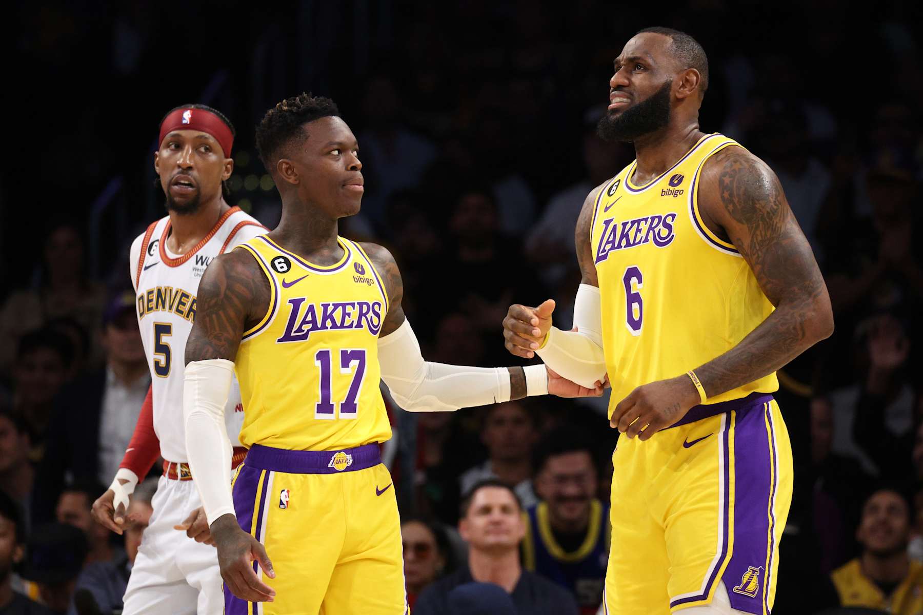 LOS ANGELES, CALIFORNIA - MAY 22: Dennis Schroder #17 and LeBron James #6 of the Los Angeles Lakers react after James' foul during the first quarter against the Denver Nuggets game four of the Western Conference Finals at Crypto.com Arena on May 22, 2023 in Los Angeles, California. NOTE TO USER: User expressly acknowledges and agrees that, by downloading and or using this photograph, User is consenting to the terms and conditions of the Getty Images License Agreement. (Photo by Harry How/Getty Images)