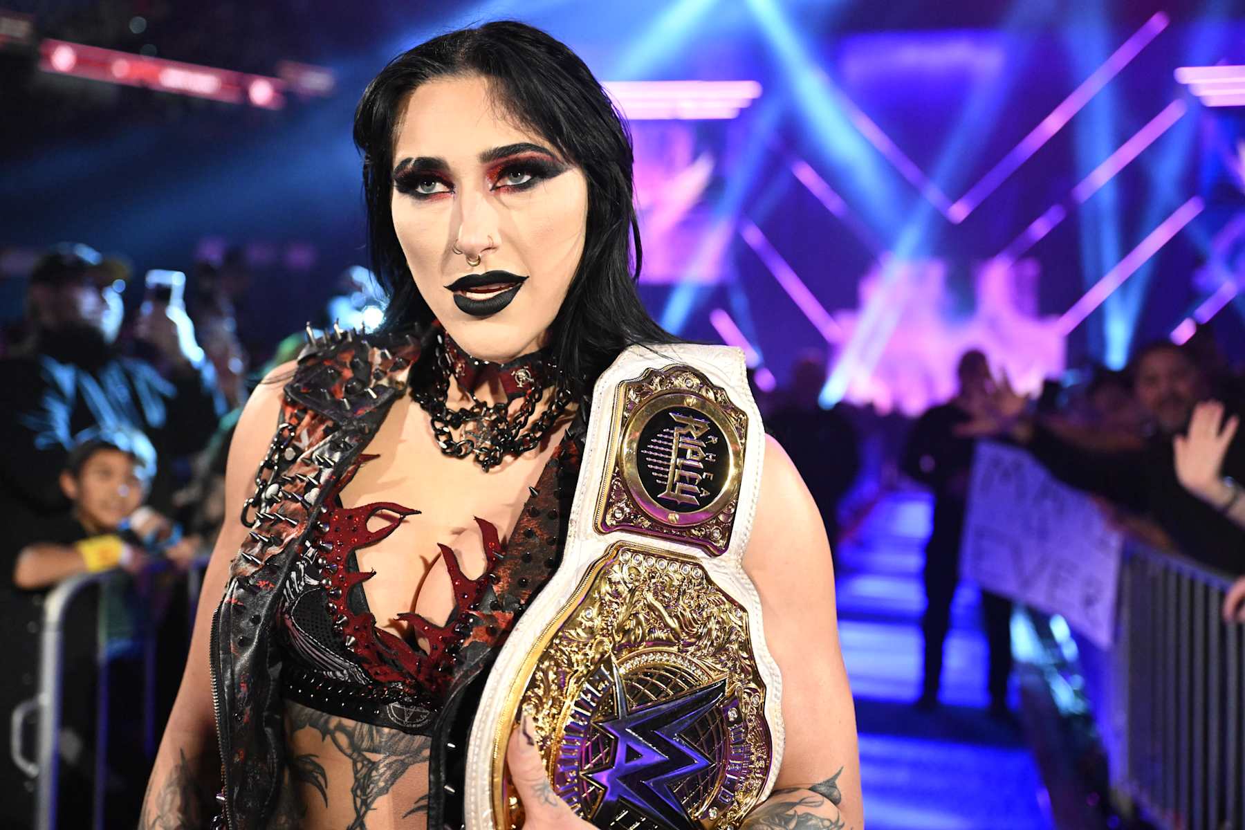 SAN ANTONIO, TEXAS - JANUARY 25: Women's World Champion Rhea Ripley makes her entrance during Saturday Night's Main Event at Frost Bank Center on January 25, 2025 in San Antonio, Texas.  (Photo by WWE/Getty Images)