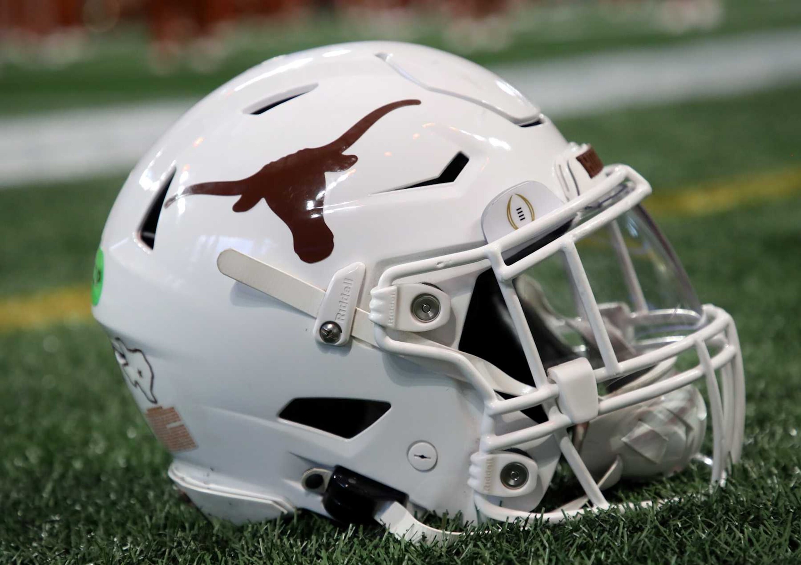 ATLANTA, GEORGIA - JANUARY 1:  A Texas Longhorns helmet is seen on the sidelines during the 2025 Peach Bowl College Football Playoff quarterfinals football game featuring the University of Texas Longhorns versus the Arizona State Sun Devils at Mercedes-Benz Stadium on January 1, 2025 in Atlanta, Georgia. (Photo by Bruce Yeung/Getty Images)