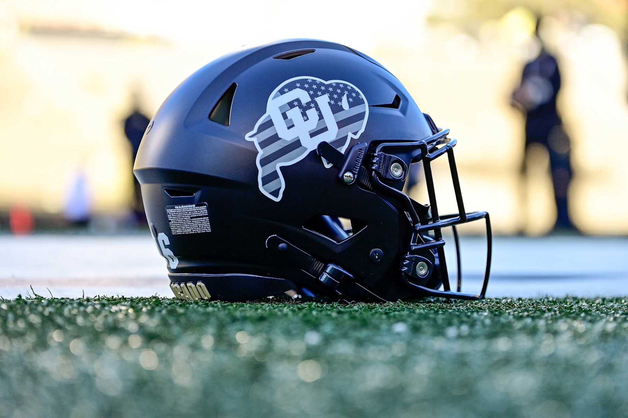 BOULDER, CO - NOVEMBER 16:  A detail view of a Colorado Buffaloes helmet is seen on the field before a game between the Colorado Buffaloes and the Utah Utes at Folsom Field on November 16, 2024 in Boulder, Colorado. (Photo by Dustin Bradford/Getty Images)