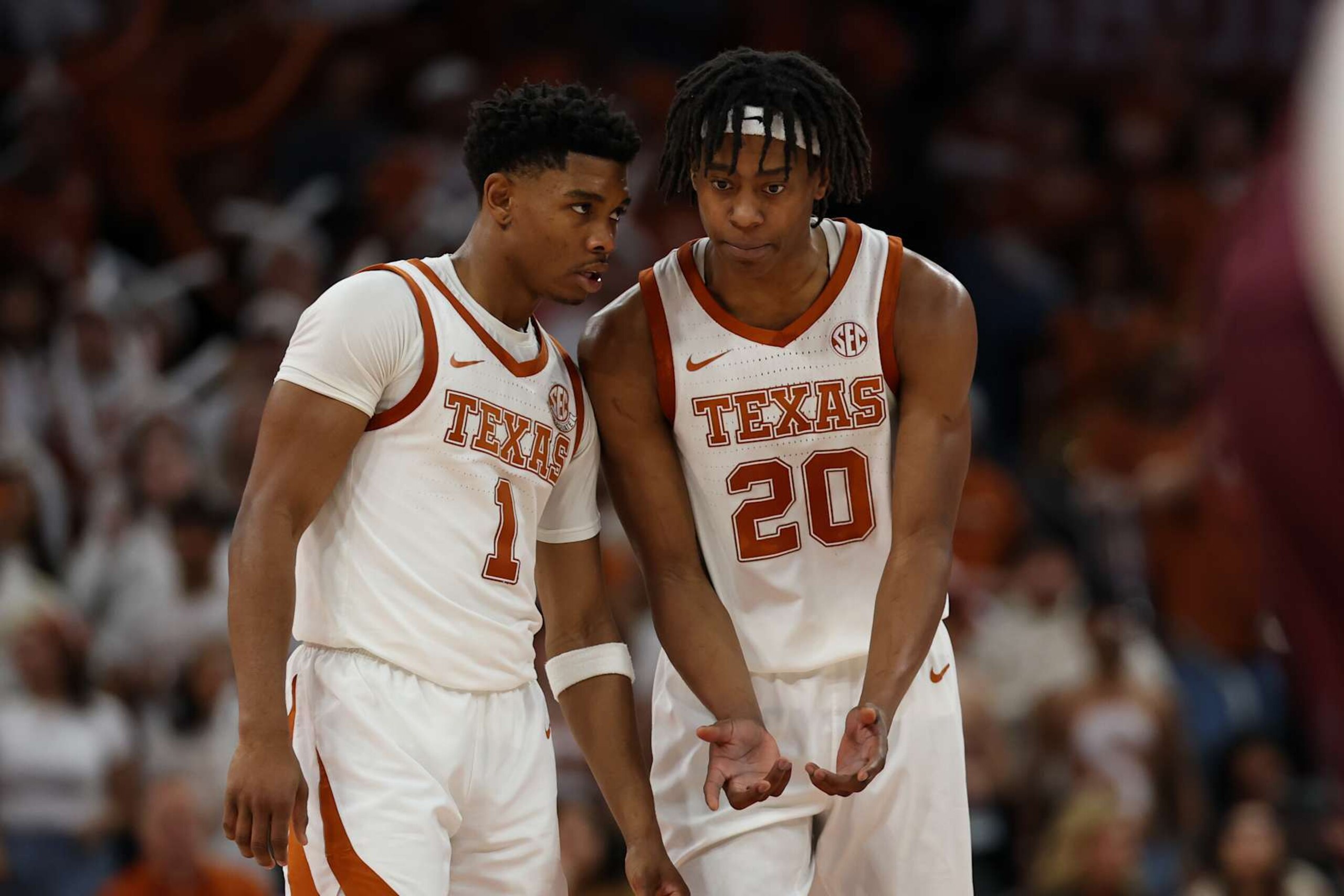Texas' Tre Johnson and Julian Larry Texas' Tre Johnson and Julian Larry