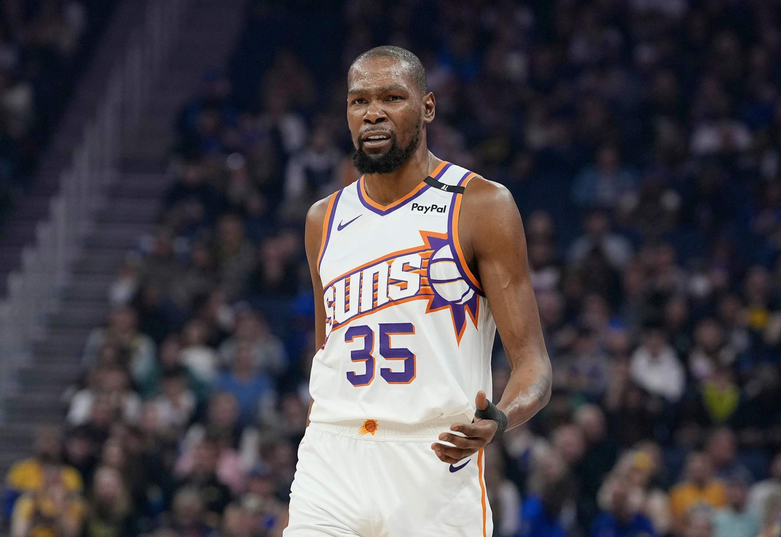 SAN FRANCISCO, CALIFORNIA - JANUARY 31: Kevin Durant #35 of the Phoenix Suns looks on against the Golden State Warriors during the first half of an NBA basketball game at Chase Center on January 31, 2025 in San Francisco, California. NOTE TO USER: User expressly acknowledges and agrees that, by downloading and or using this photograph, User is consenting to the terms and conditions of the Getty Images License Agreement. (Photo by Thearon W. Henderson/Getty Images)