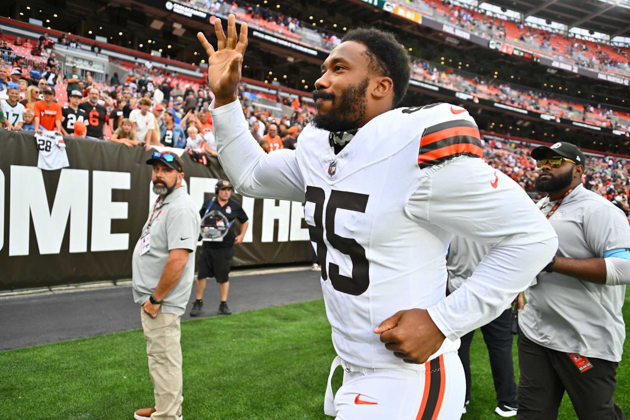 CLEVELAND, OHIO - AUGUST 10: Defensive end Myles Garrett #95 of the Cleveland Browns waves to the crowd after a preseason game against the Green Bay Packers at Cleveland Browns Stadium on August 10, 2024 in Cleveland, Ohio. The Packers defeated the Browns 23-10.  (Photo by Jason Miller/Getty Images)