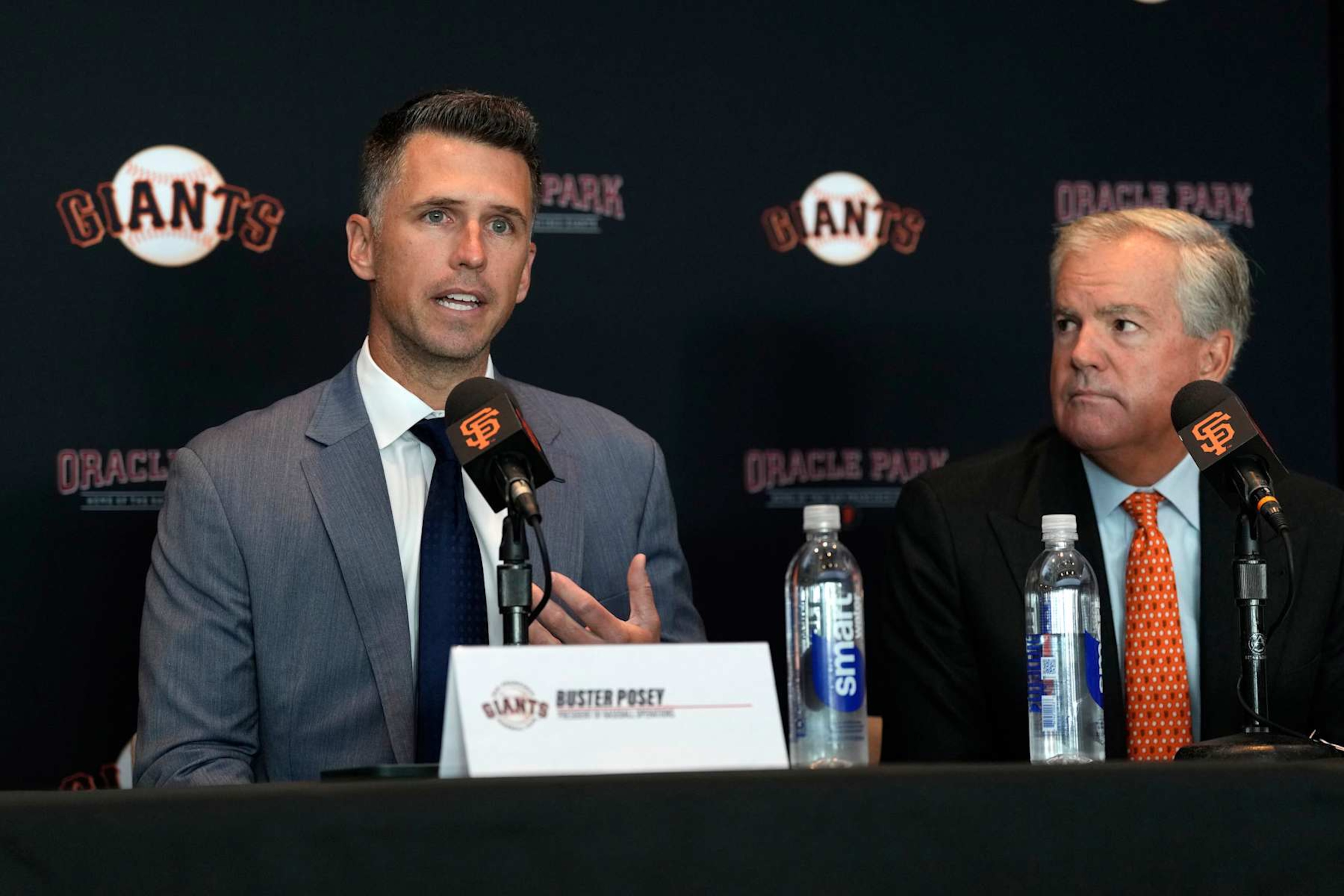 Buster Posey (left) and Greg Johnson in October 2024