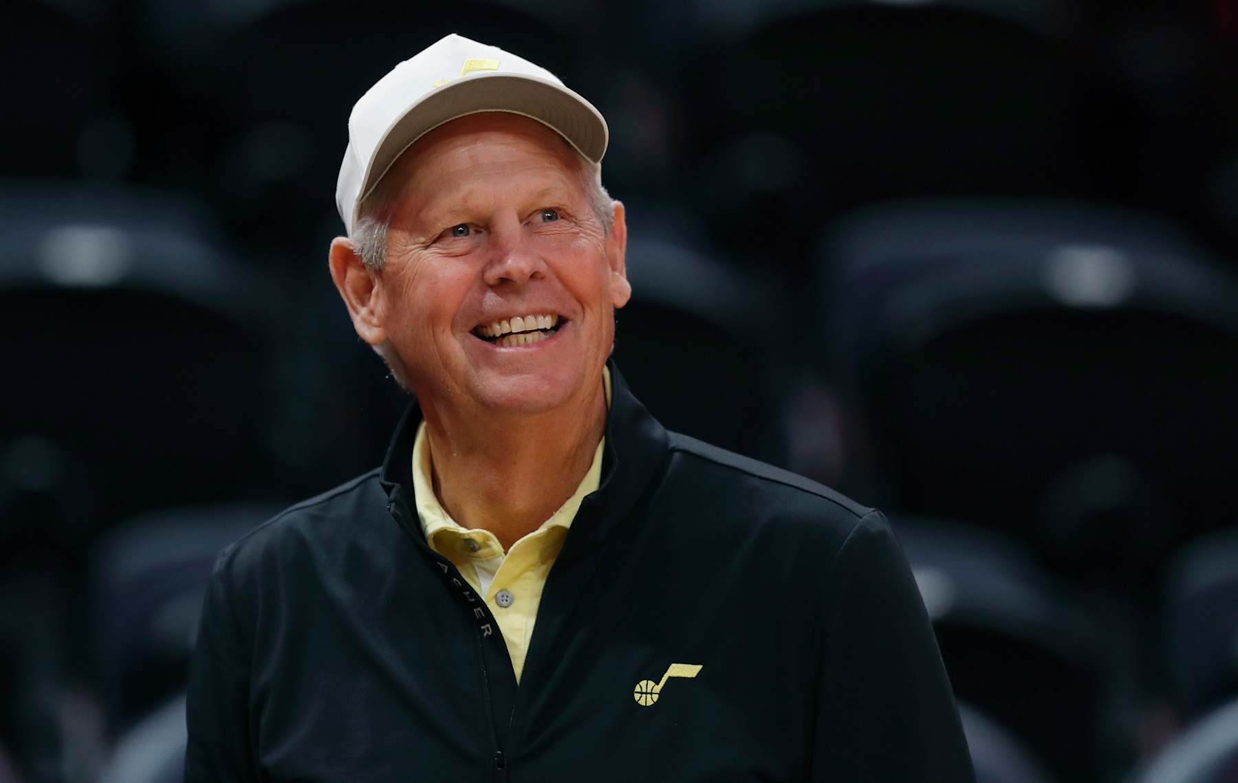 SALT LAKE CITY, UT - OCTOBER 27:  Danny Ainge the CEO of the Utah Jazz laughs as he watches warmups before their game against the Los Angeles Clippers at the Delta Center on October 27 2023 in Salt Lake City, Utah. NOTE TO USER: User expressly acknowledges and agrees that, by downloading and or using this photograph, User is consenting to the terms and conditions of the Getty Images License Agreement. (Photo by Chris Gardner/Getty Images)