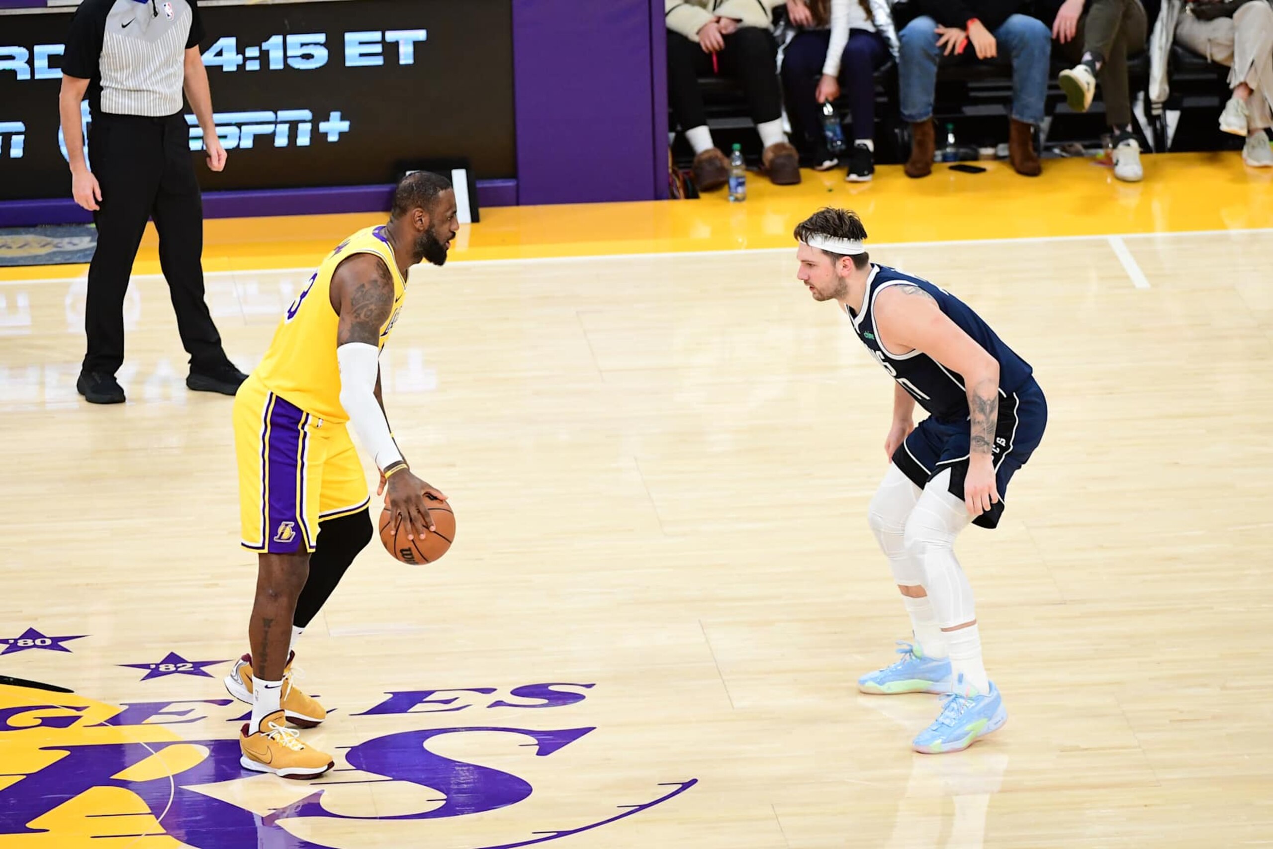 LOS ANGELES, CA - JANUARY 17: LeBron James #23 of the Los Angeles Lakers handles the ball against defender Luka Doncic #77 of the Dallas Mavericks during the game on January 17, 2024 at Crypto.Com Arena in Los Angeles, California. NOTE TO USER: User expressly acknowledges and agrees that, by downloading and/or using this Photograph, user is consenting to the terms and conditions of the Getty Images License Agreement. Mandatory Copyright Notice: Copyright 2024 NBAE (Photo by Adam Pantozzi/NBAE via Getty Images)