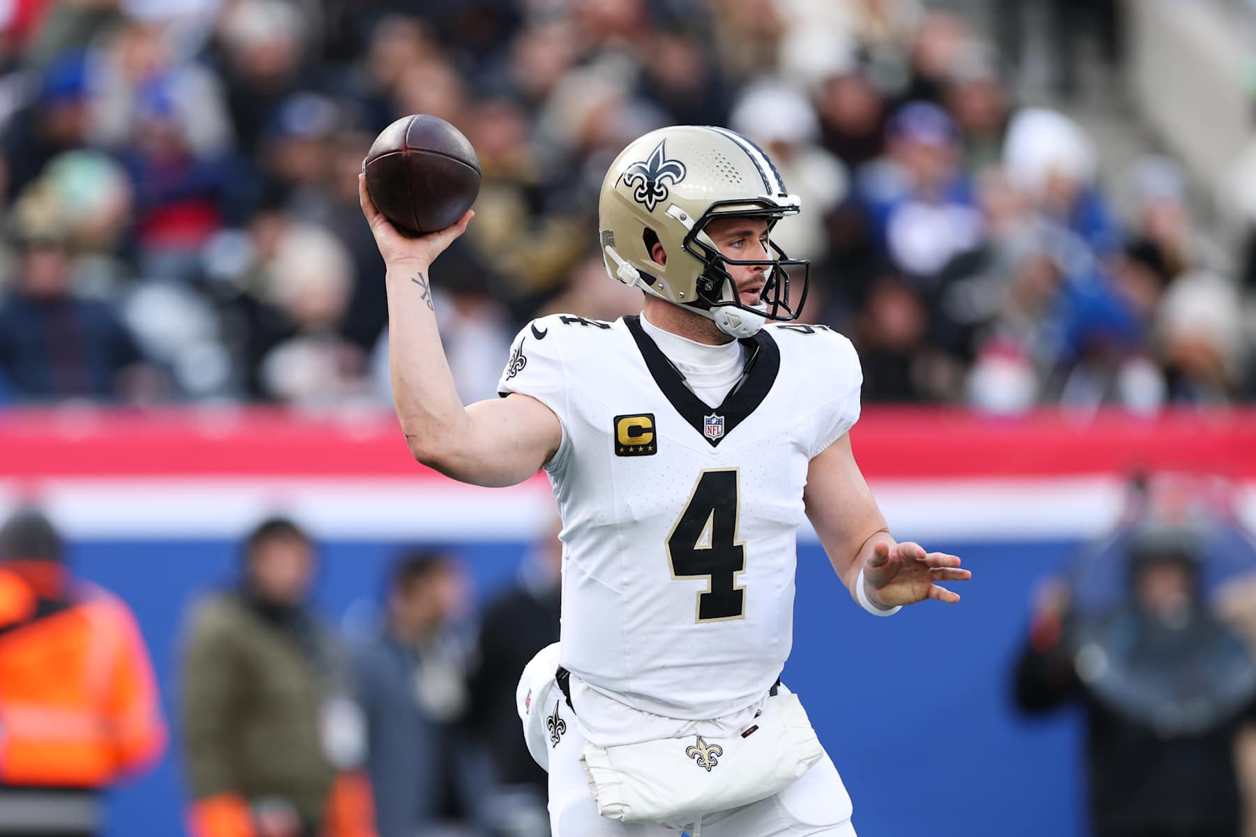 EAST RUTHERFORD, NEW JERSEY - DECEMBER 8: Derek Carr #4 of the New Orleans Saints looks to throw the football during the second quarter against the New York Giants at MetLife Stadium on December 8, 2024 in East Rutherford, New Jersey. (Photo by Kathryn Riley/Getty Images)