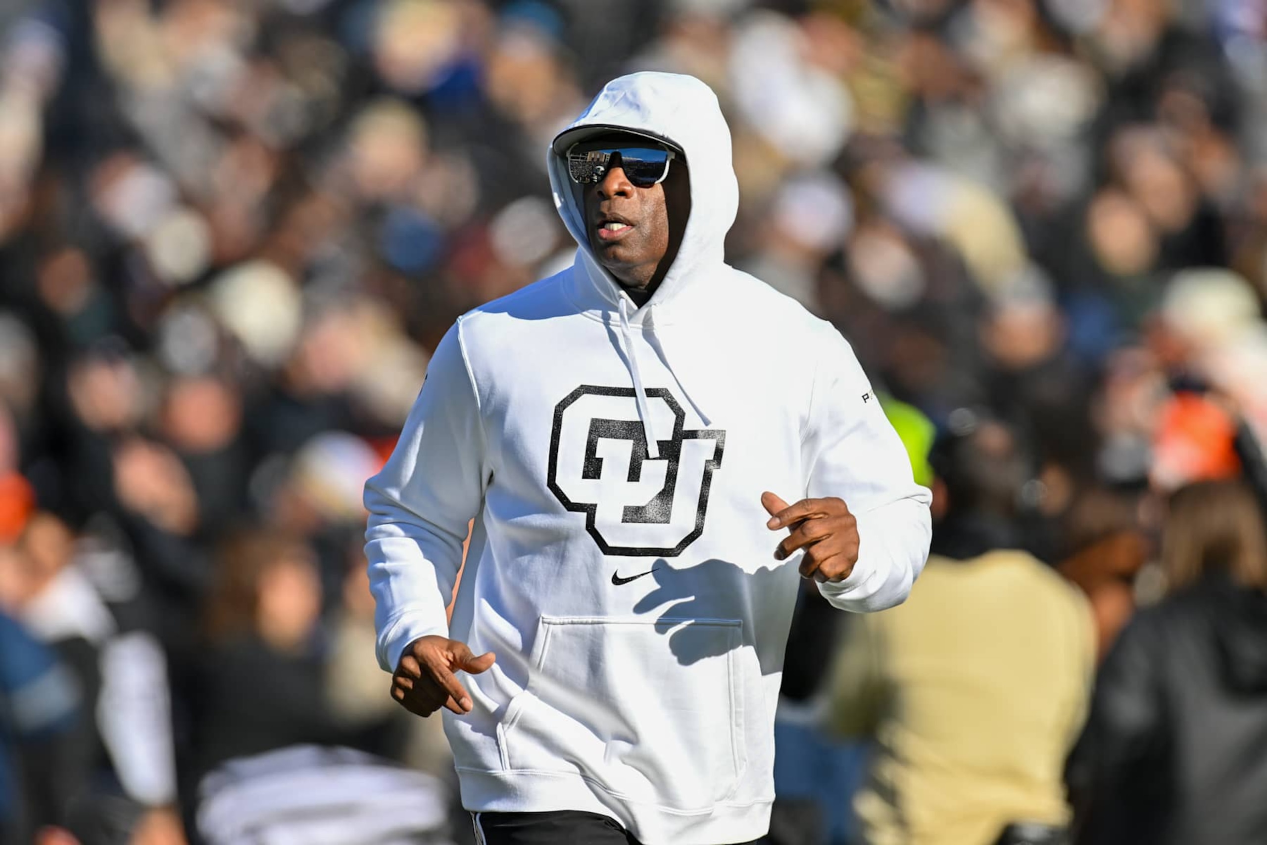 BOULDER, CO - NOVEMBER 29: Colorado head coach Deion Sanders during the college football game between the Oklahoma State University Cowboys and the University of Colorado Buffaloes on November 29, 2024 at Folsom Field in Boulder, CO. (Photo by Kevin Langley/Icon Sportswire via Getty Images) BOULDER, CO - NOVEMBER 29: Colorado head coach Deion Sanders during the college football game between the Oklahoma State University Cowboys and the University of Colorado Buffaloes on November 29, 2024 at Folsom Field in Boulder, CO. (Photo by Kevin Langley/Icon Sportswire via Getty Images)